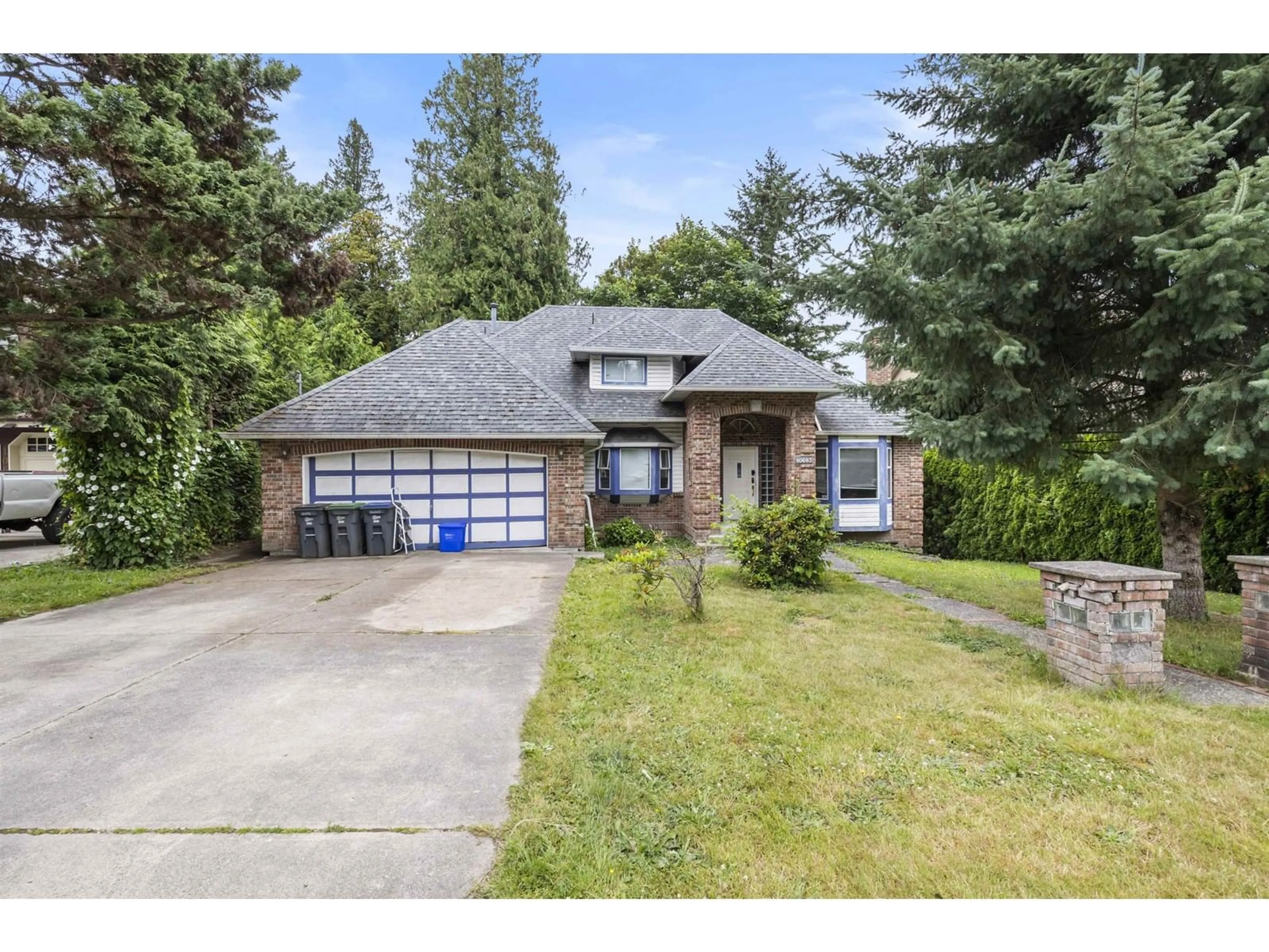 Home with brick exterior material, street for 10693 127A, Surrey British Columbia V3V5L7