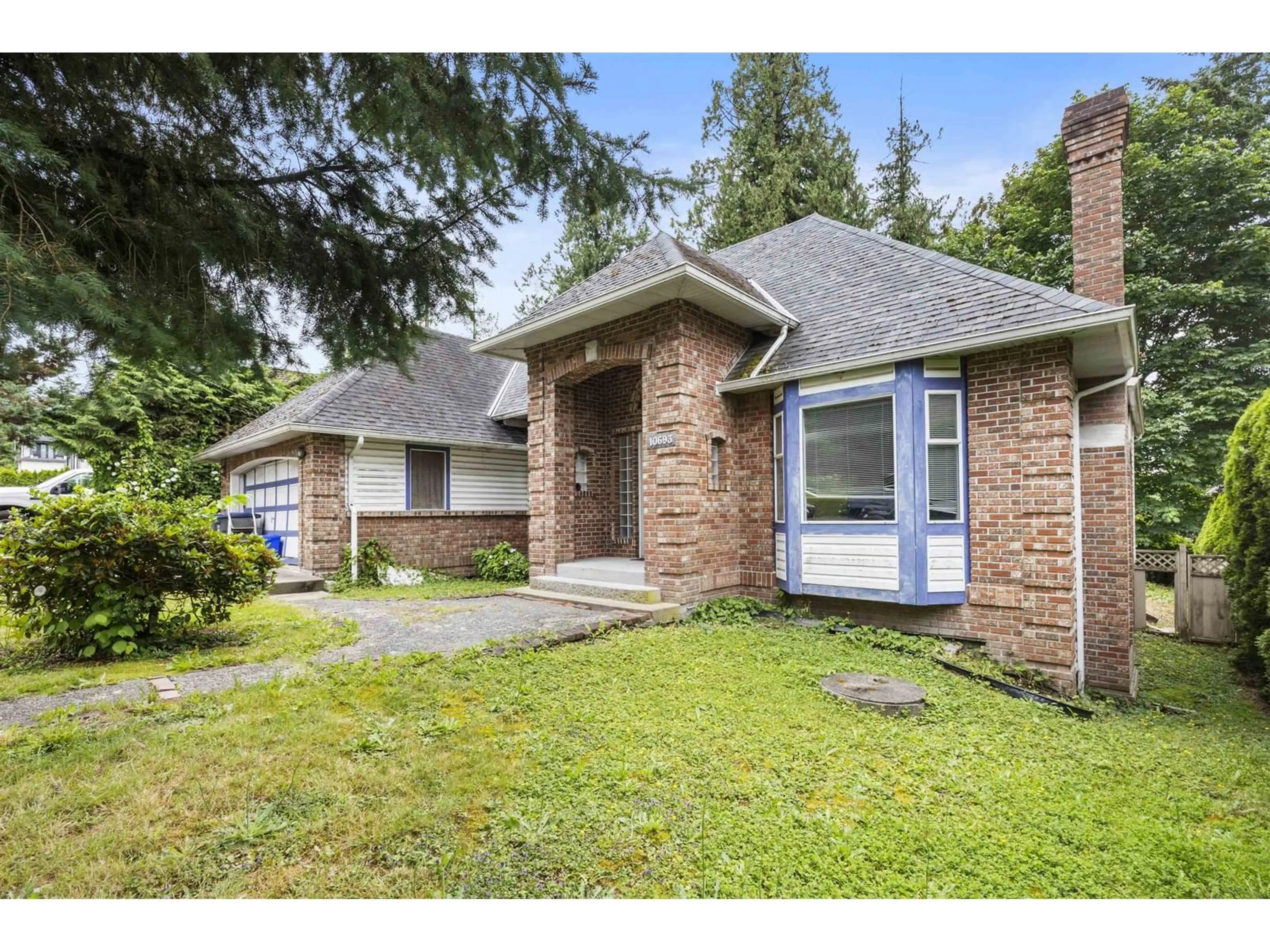 Home with brick exterior material, street for 10693 127A, Surrey British Columbia V3V5L7