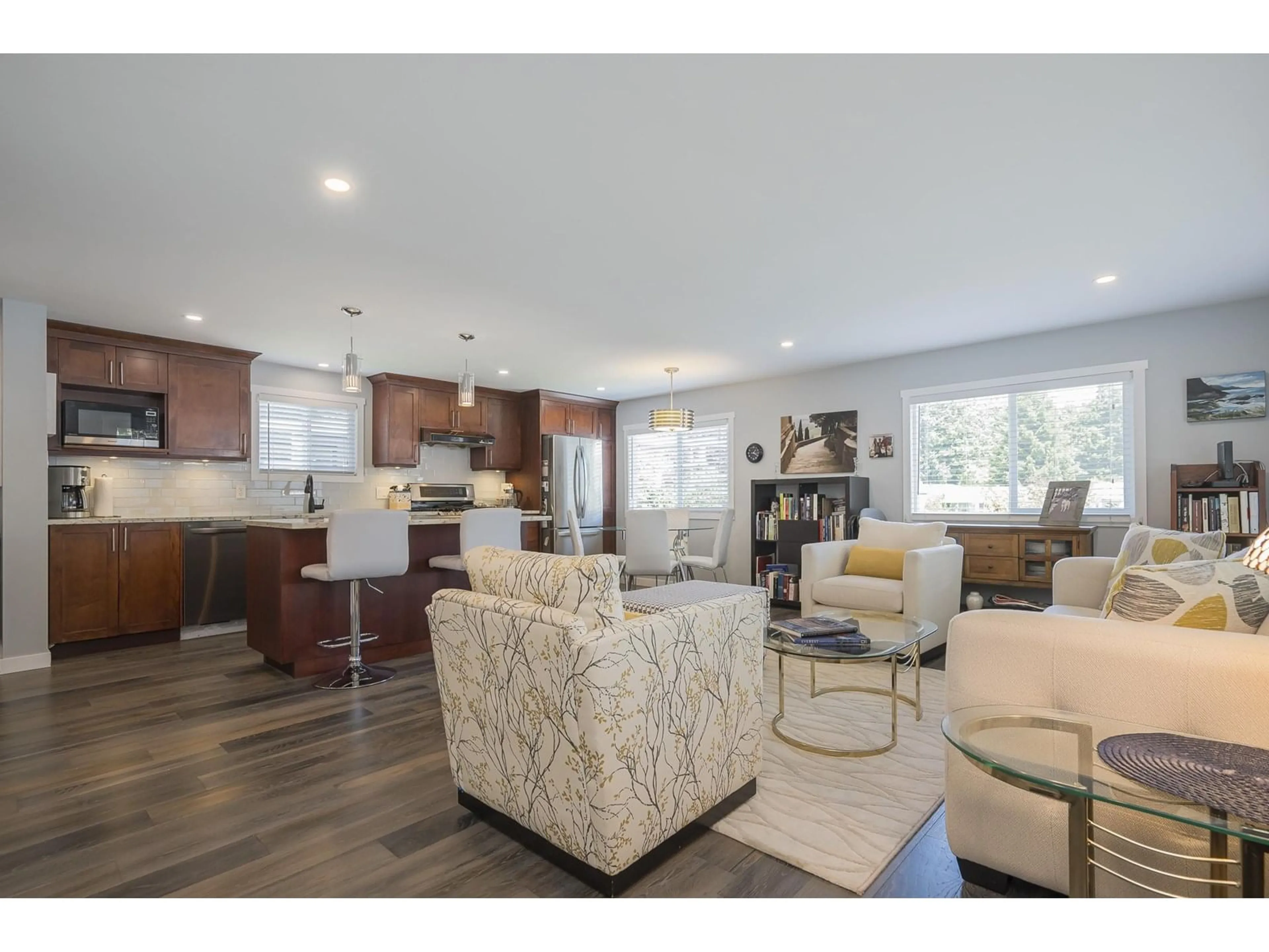 Living room with furniture, wood/laminate floor for 233 - 1840 160, Surrey British Columbia V4A4X4