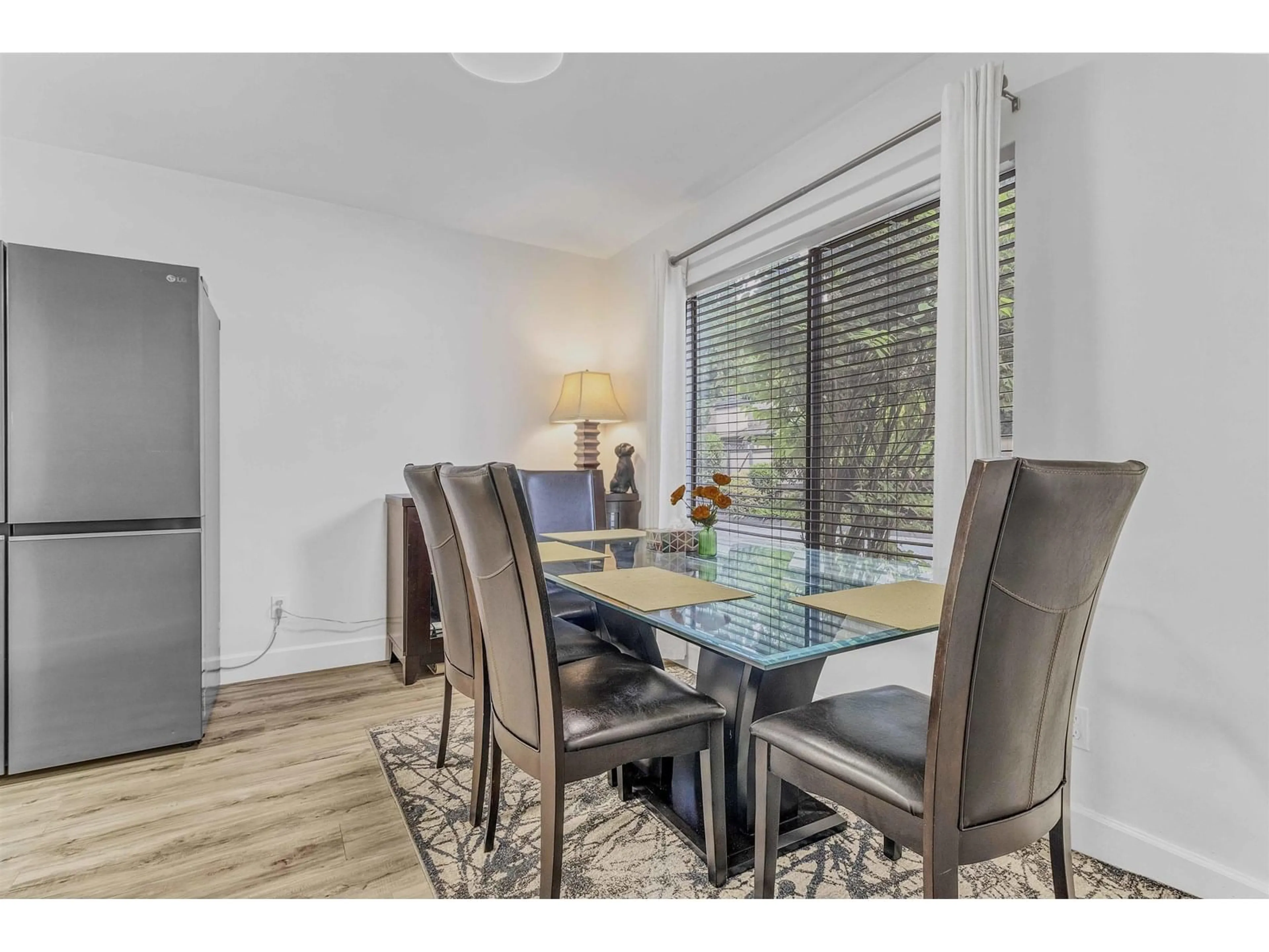 Dining room, wood/laminate floor for 8 - 3015 TRETHEWEY, Abbotsford British Columbia V2T3R4