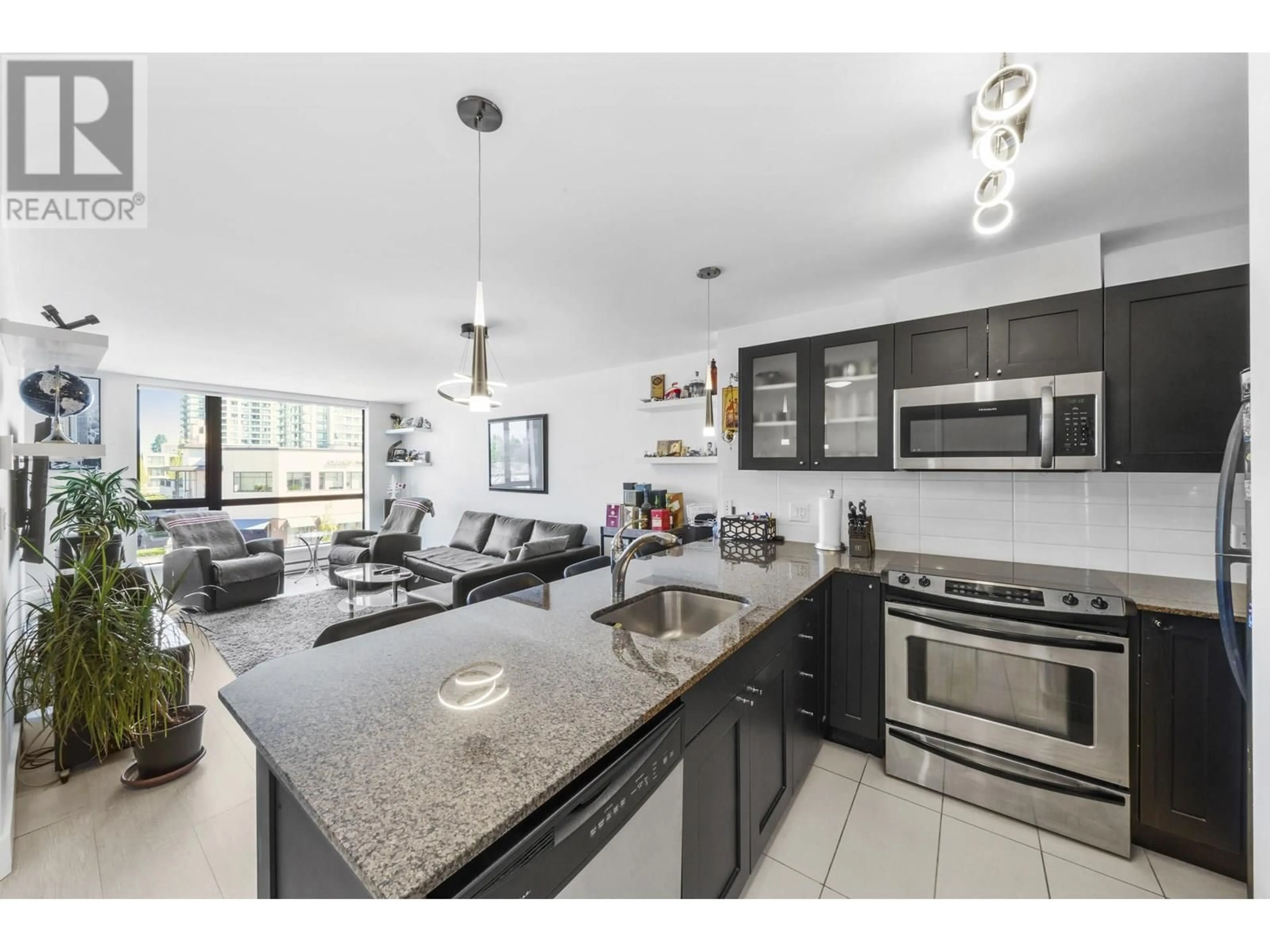 Open concept kitchen, ceramic/tile floor for 502 - 7225 ACORN AVENUE, Burnaby British Columbia V5E0A9