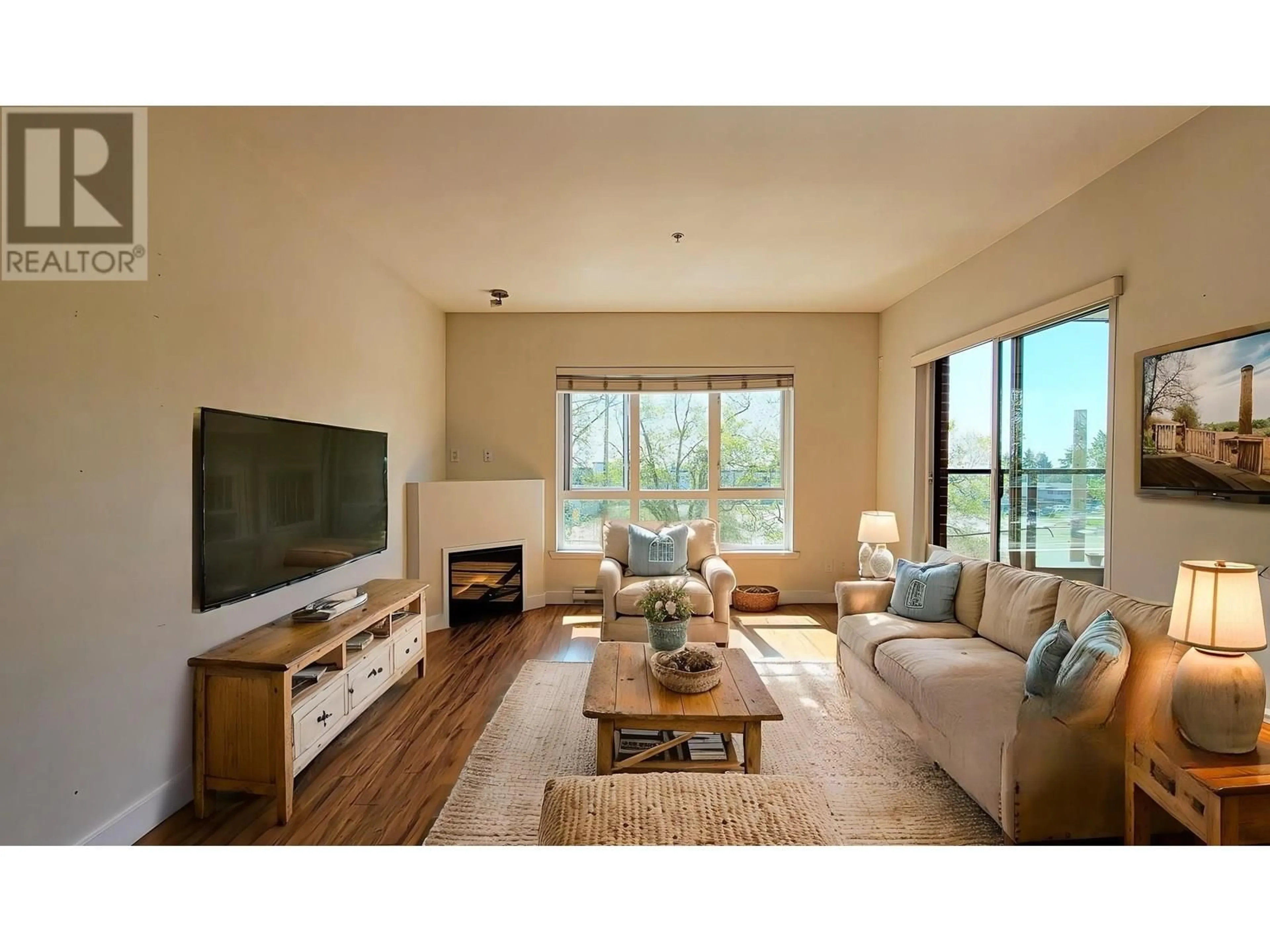 Living room with furniture, unknown for 311 - 7655 EDMONDS STREET, Burnaby British Columbia V3N1B6