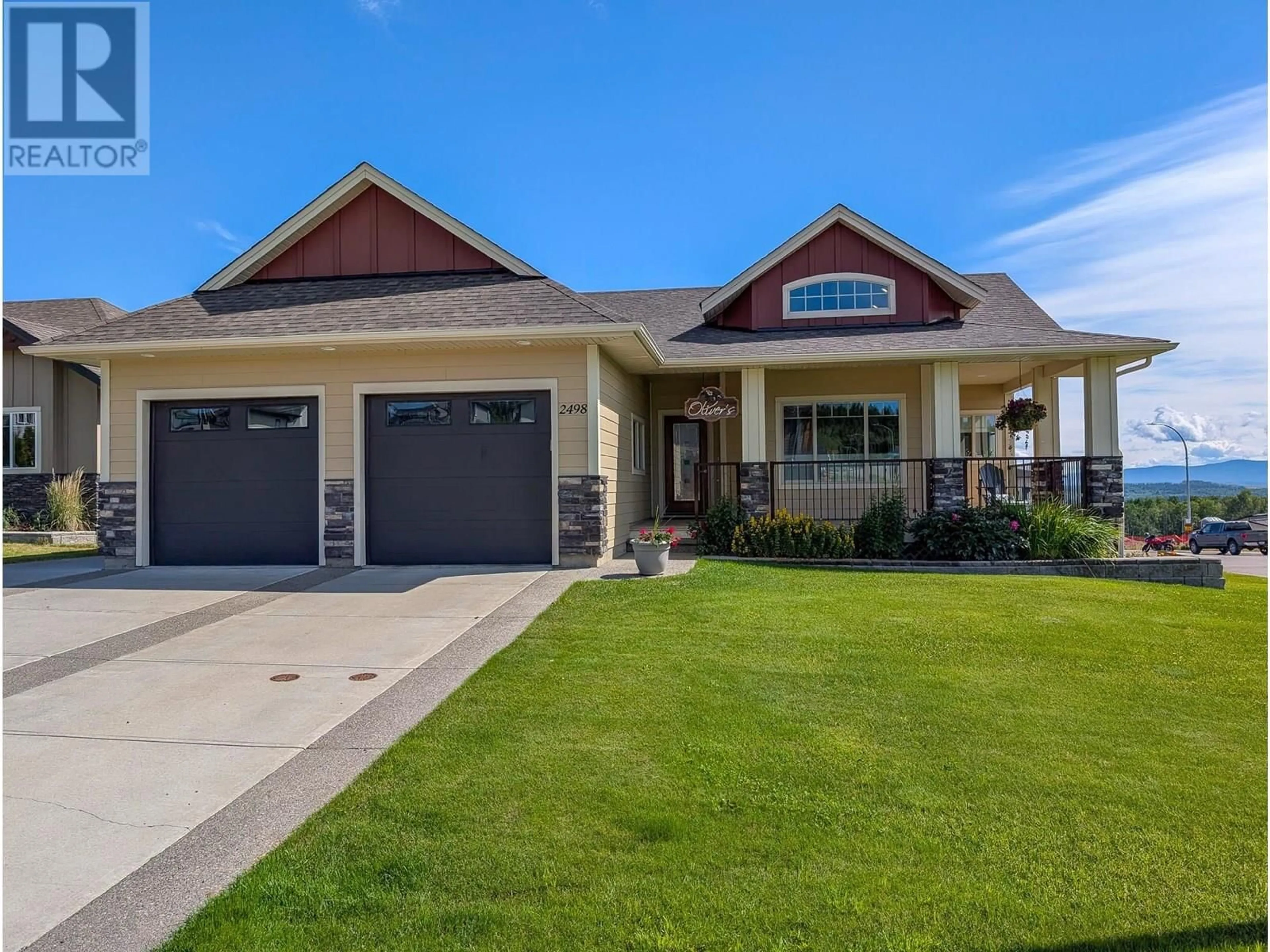 Home with vinyl exterior material, street for 2498 CHANCELLOR BOULEVARD, Prince George British Columbia V2N0E6