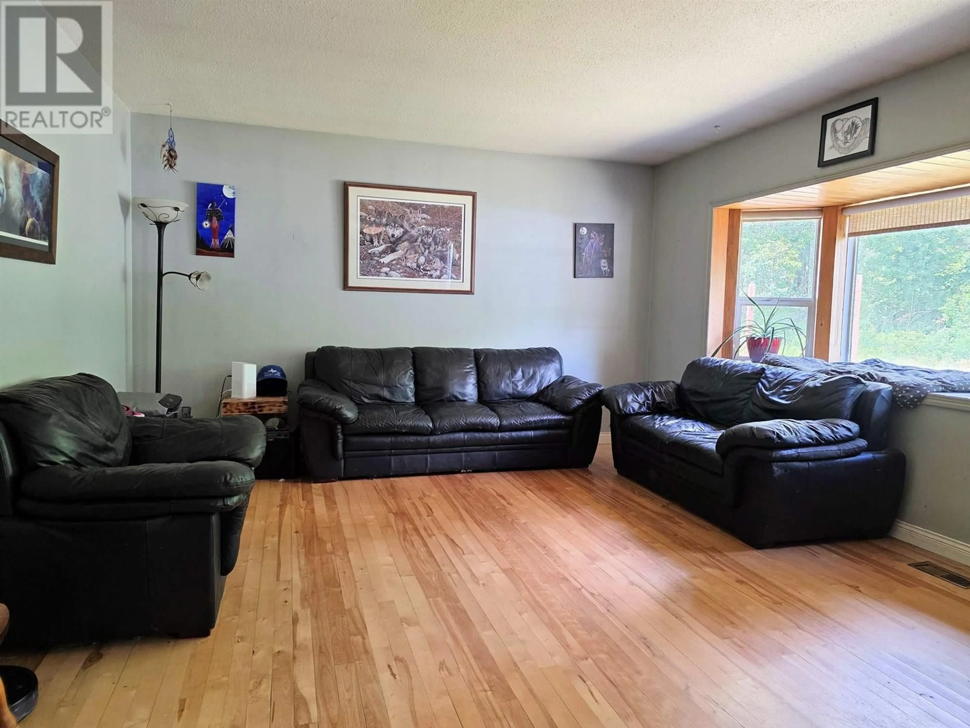 Living room with furniture, wood/laminate floor for 3826 MOUNTAINVIEW DRIVE, Kitwanga British Columbia V0J2A0