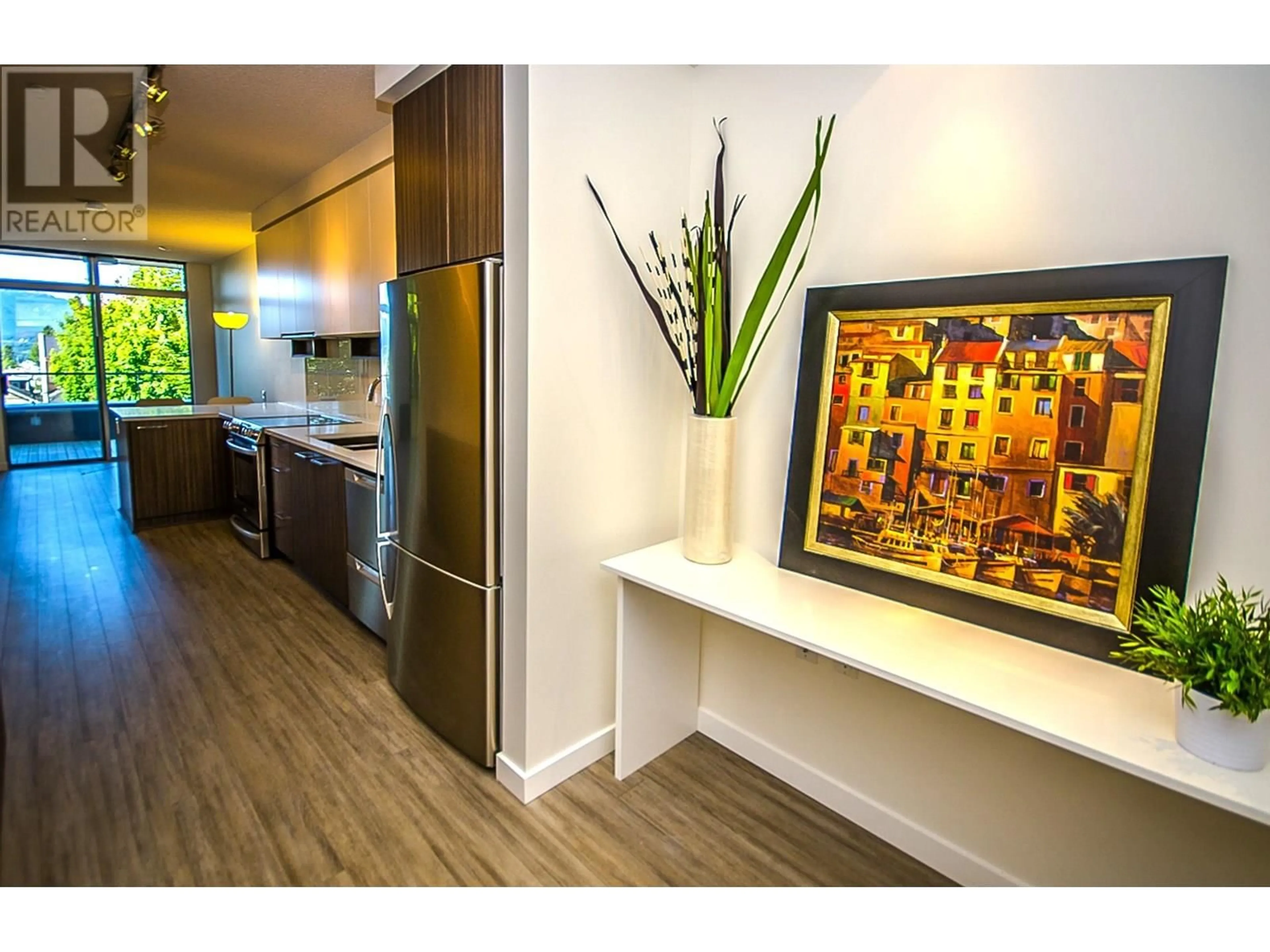 Contemporary kitchen, wood/laminate floor for 315 - 4310 HASTINGS STREET, Burnaby British Columbia V5C2J9
