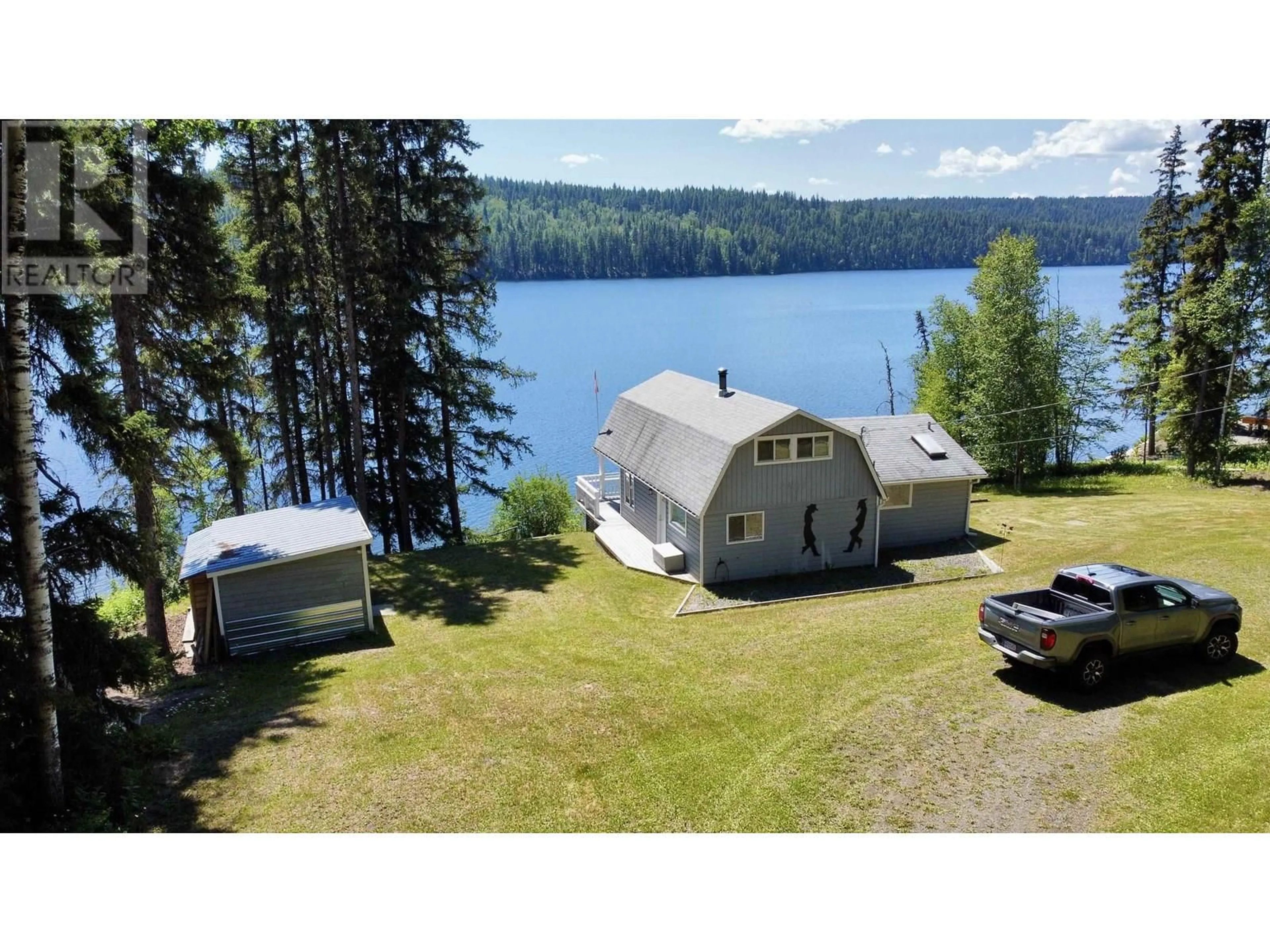 A pic from outside/outdoor area/front of a property/back of a property/a pic from drone, water/lake/river/ocean view for 5772 TIMOTHY LAKE ROAD, Lac La Hache British Columbia V0K1T0