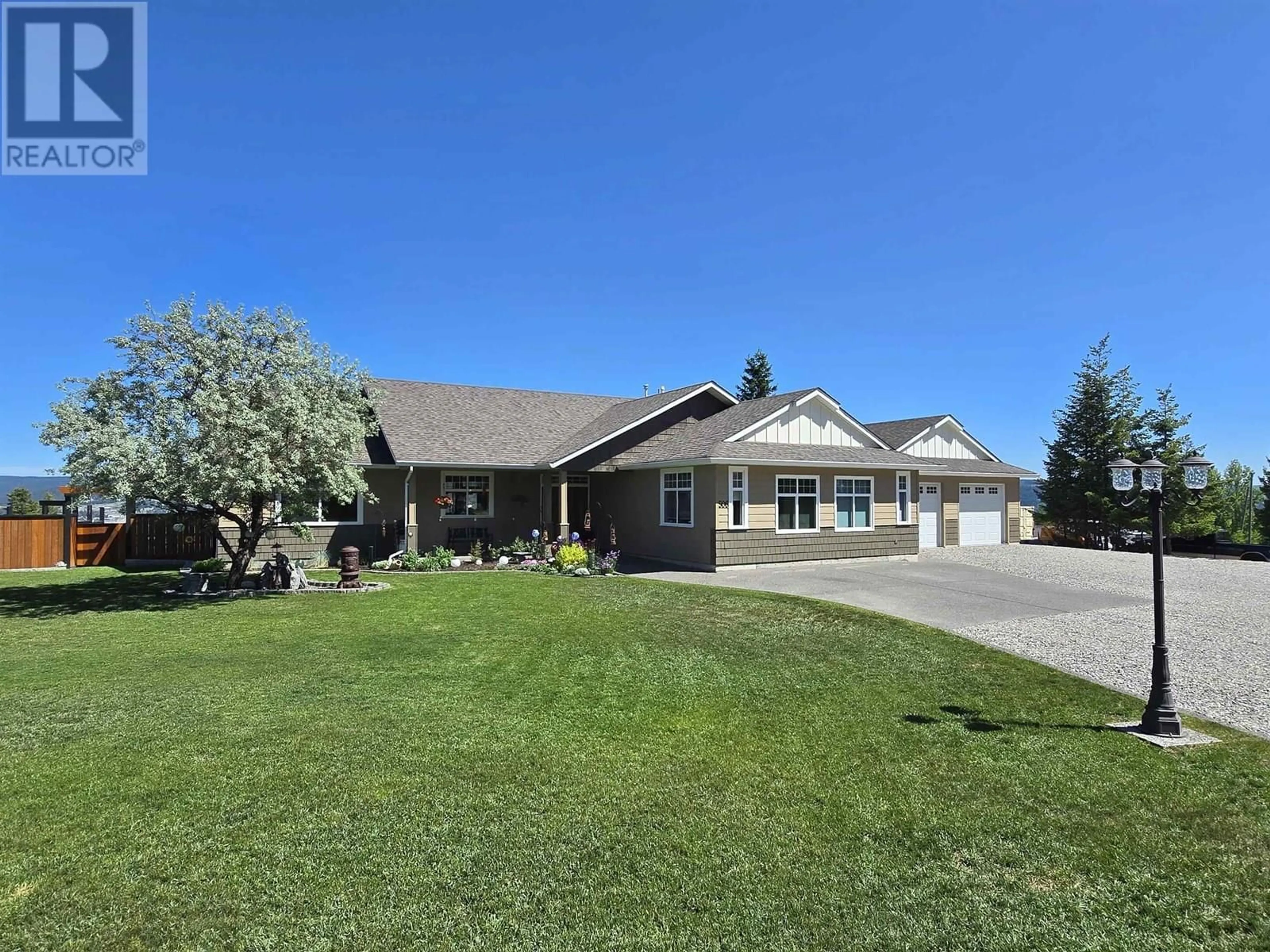 A pic from outside/outdoor area/front of a property/back of a property/a pic from drone, unknown for 506 TAMARACK ROAD, Williams Lake British Columbia V2G4J2
