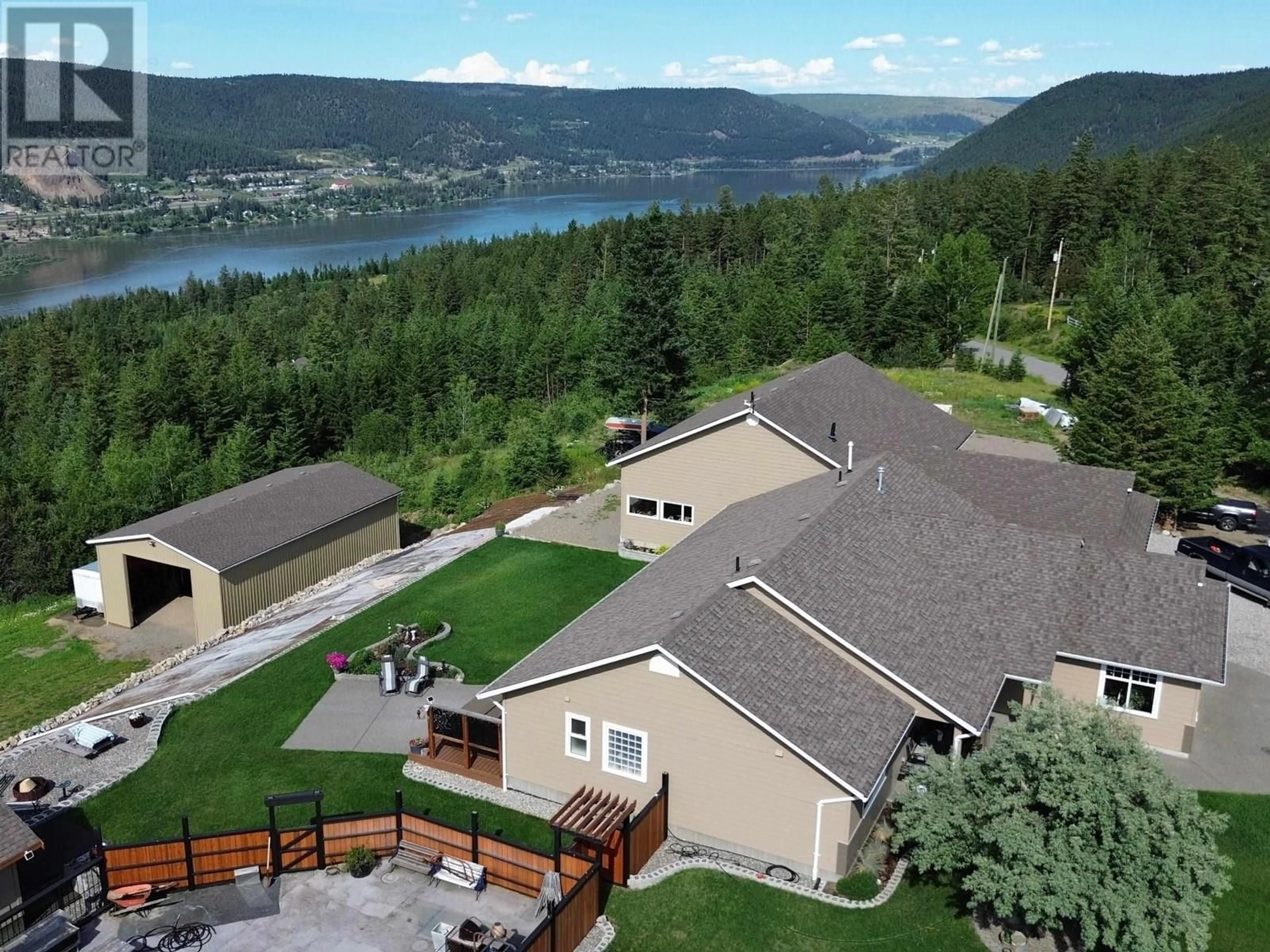 A pic from outside/outdoor area/front of a property/back of a property/a pic from drone, water/lake/river/ocean view for 506 TAMARACK ROAD, Williams Lake British Columbia V2G4J2
