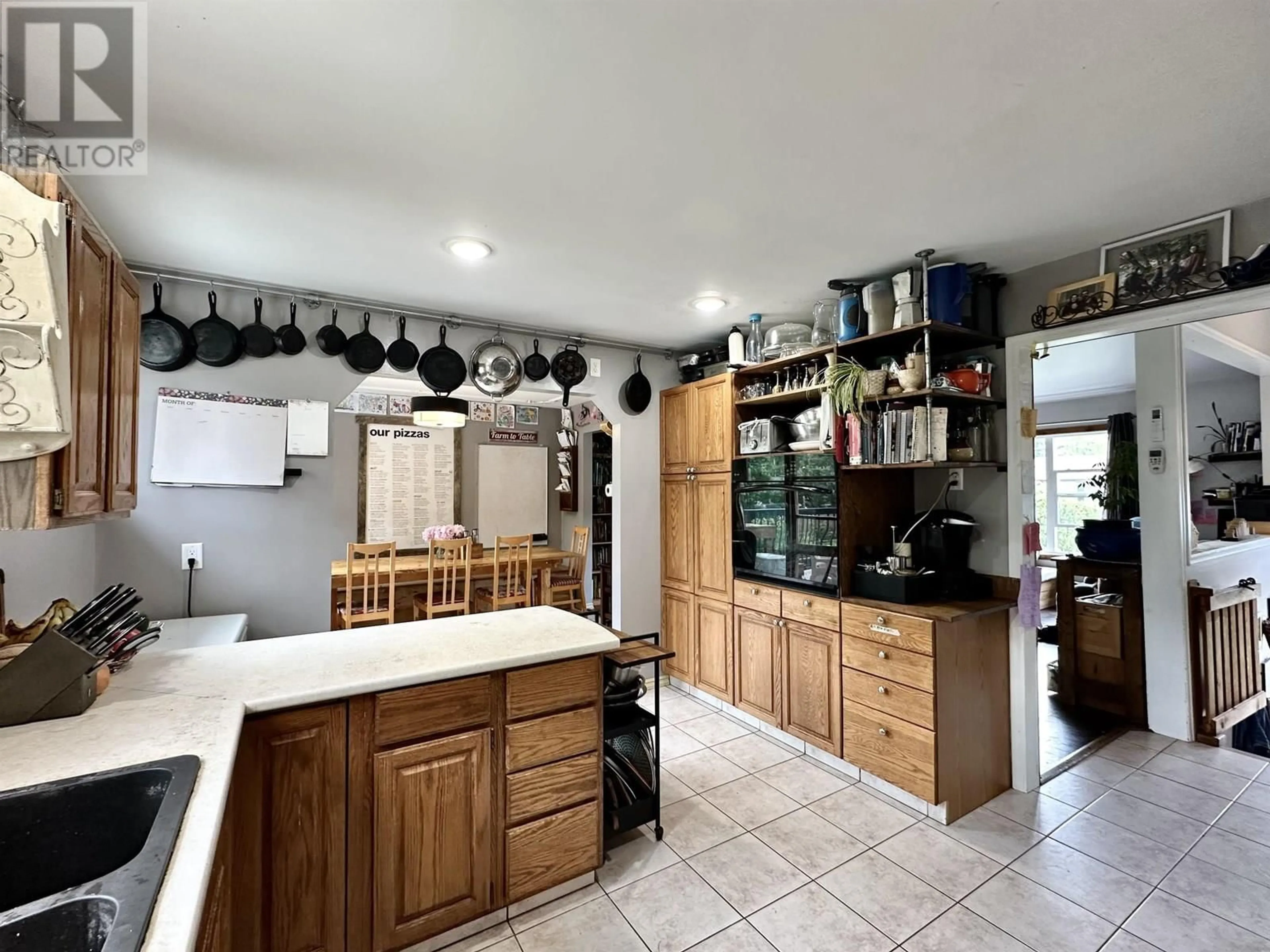 Open concept kitchen, ceramic/tile floor for 765 DOMINION STREET, McBride British Columbia V0J2E0