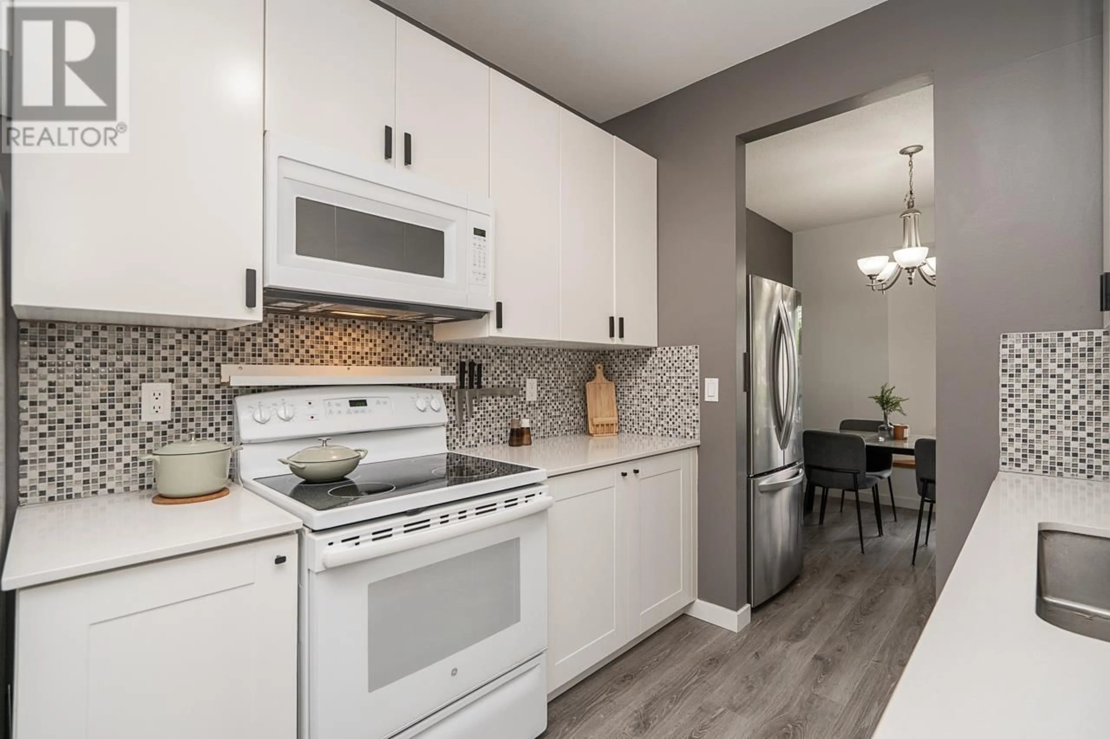 Open concept kitchen, unknown for 107 - 3767 NORFOLK STREET, Burnaby British Columbia V5G1E3