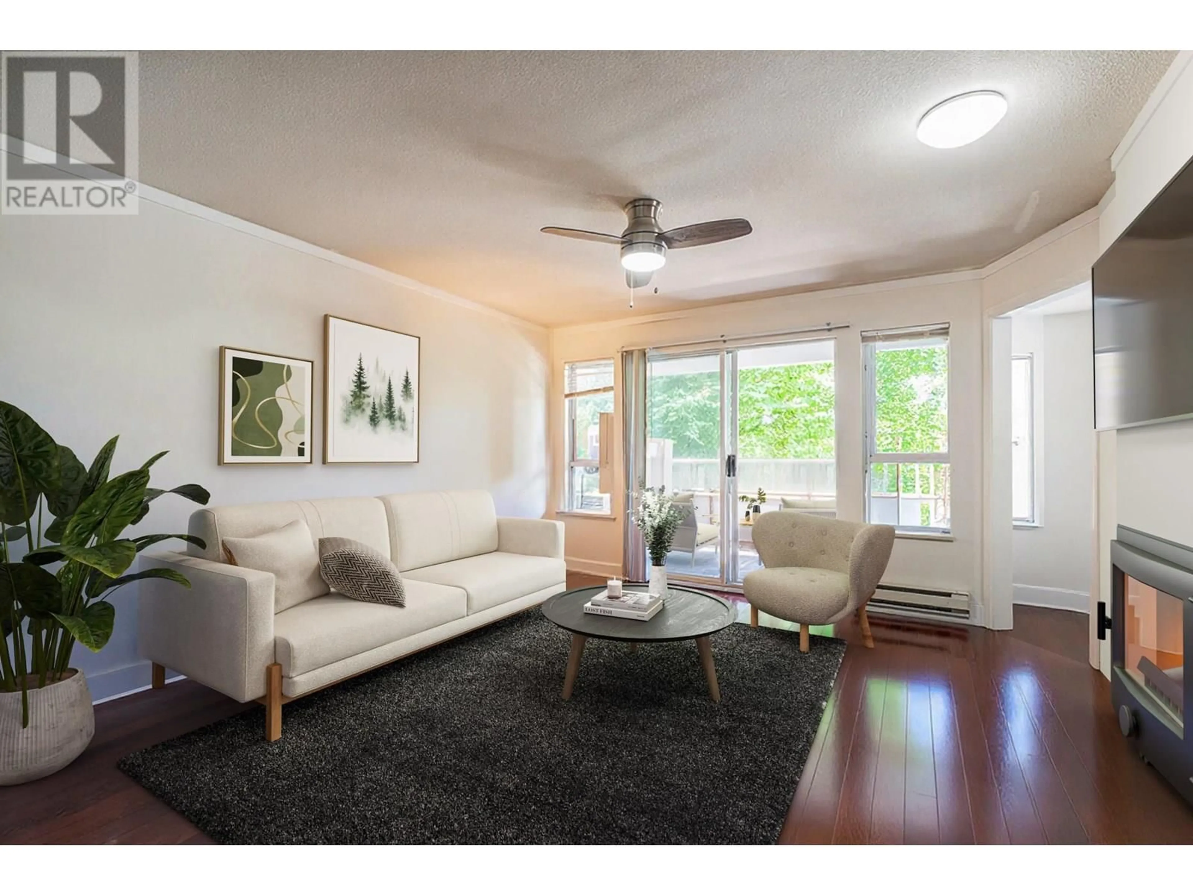 Living room with furniture, wood/laminate floor for 304 - 525 AUSTIN AVENUE, Coquitlam British Columbia V3K3M6