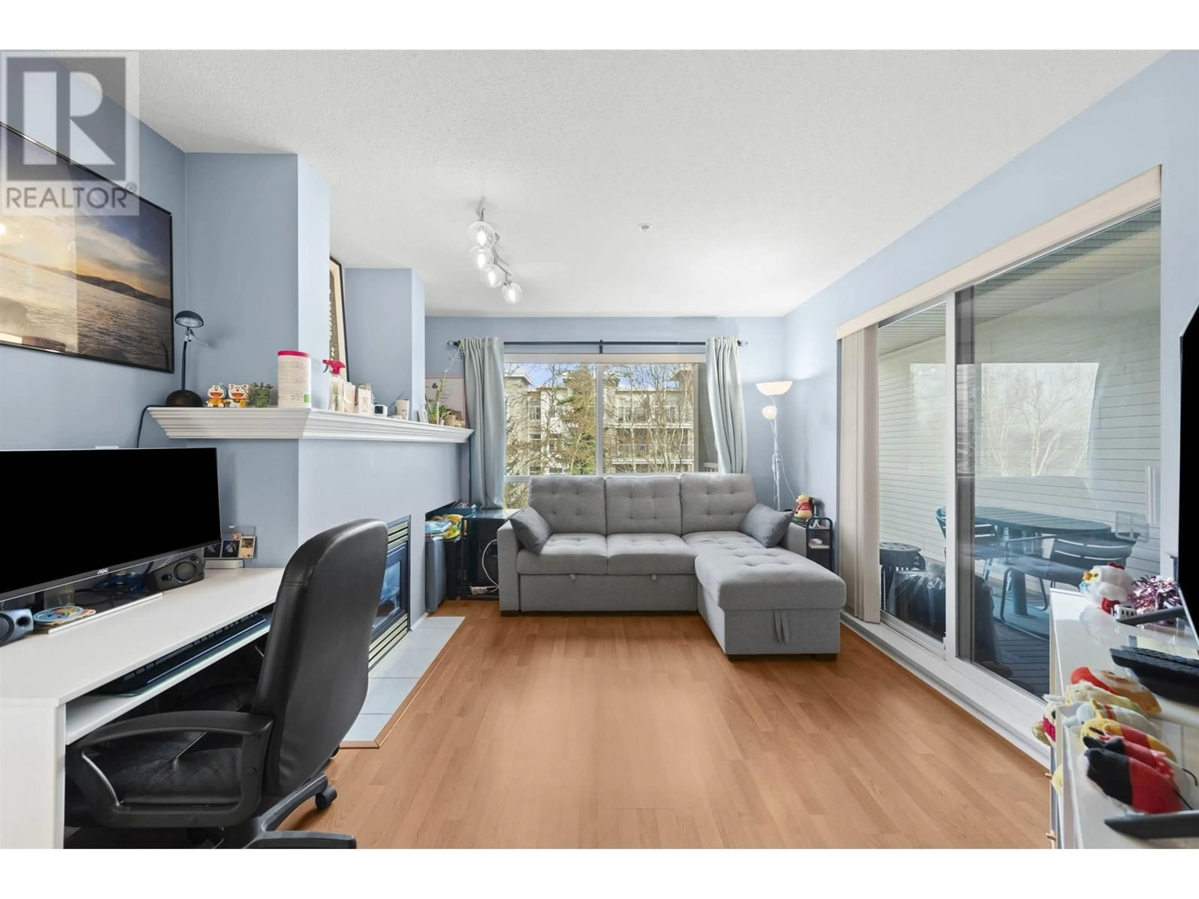 Living room with furniture, wood/laminate floor for 337 - 5600 ANDREWS ROAD, Richmond British Columbia V7E6N1