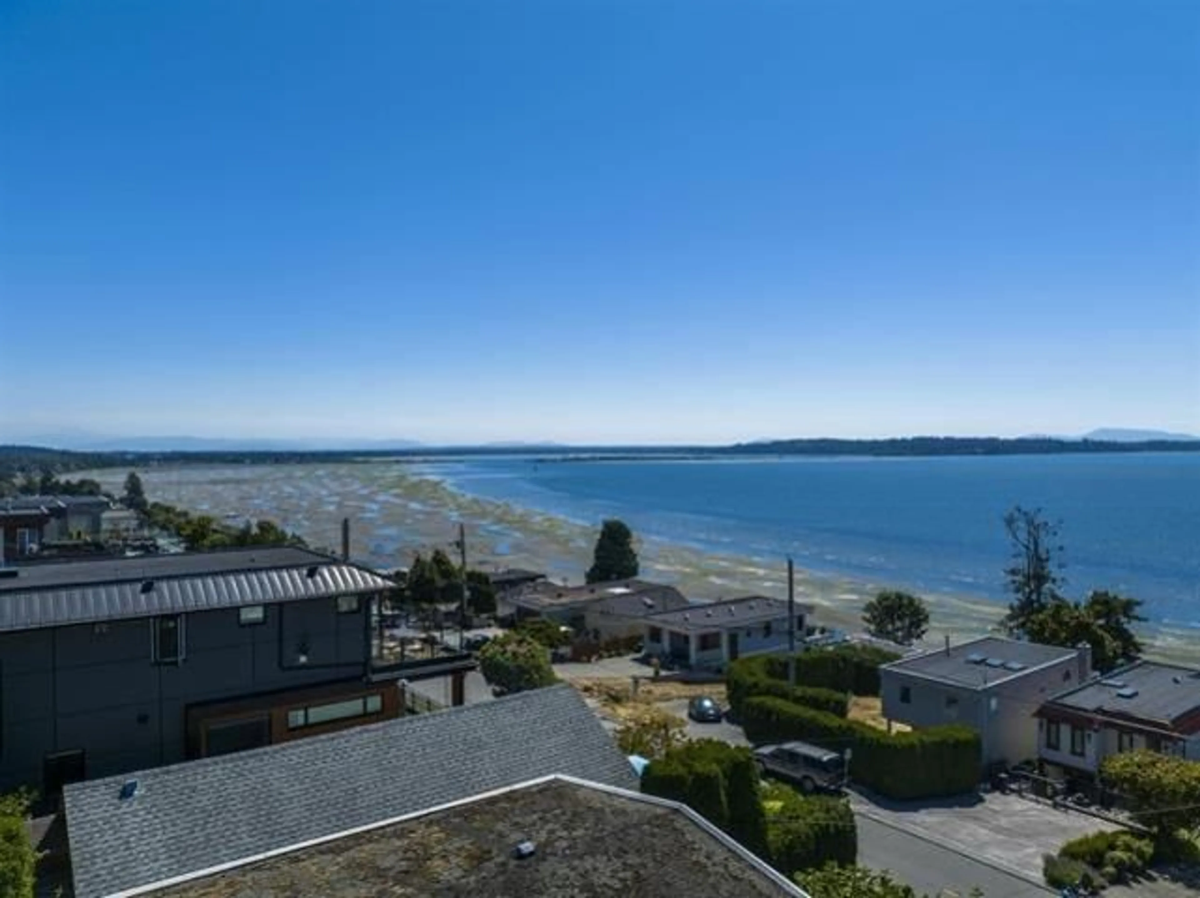 A pic from outside/outdoor area/front of a property/back of a property/a pic from drone, water/lake/river/ocean view for 15253 VICTORIA, White Rock British Columbia V4B1G7