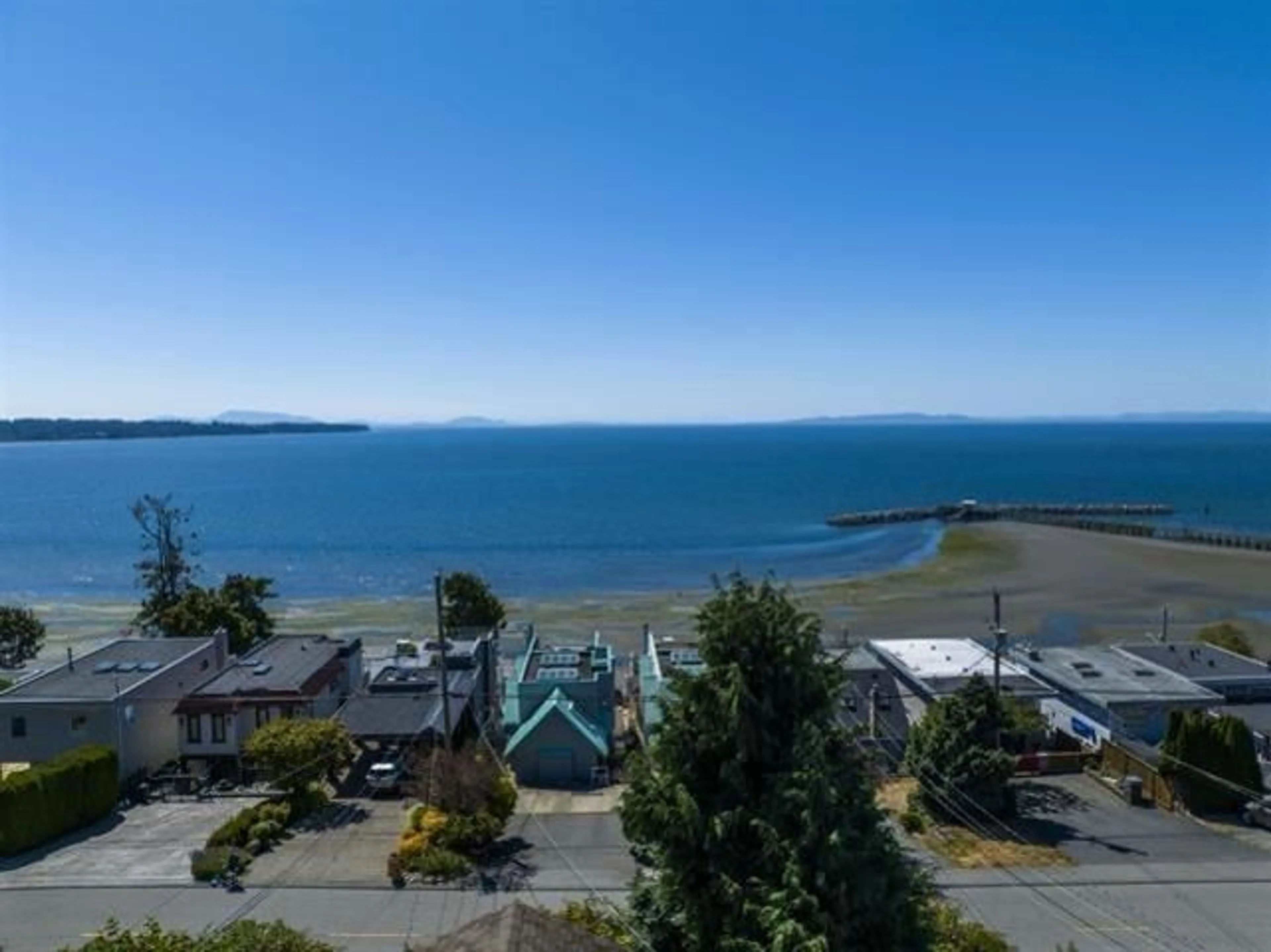 A pic from outside/outdoor area/front of a property/back of a property/a pic from drone, water/lake/river/ocean view for 15253 VICTORIA, White Rock British Columbia V4B1G7