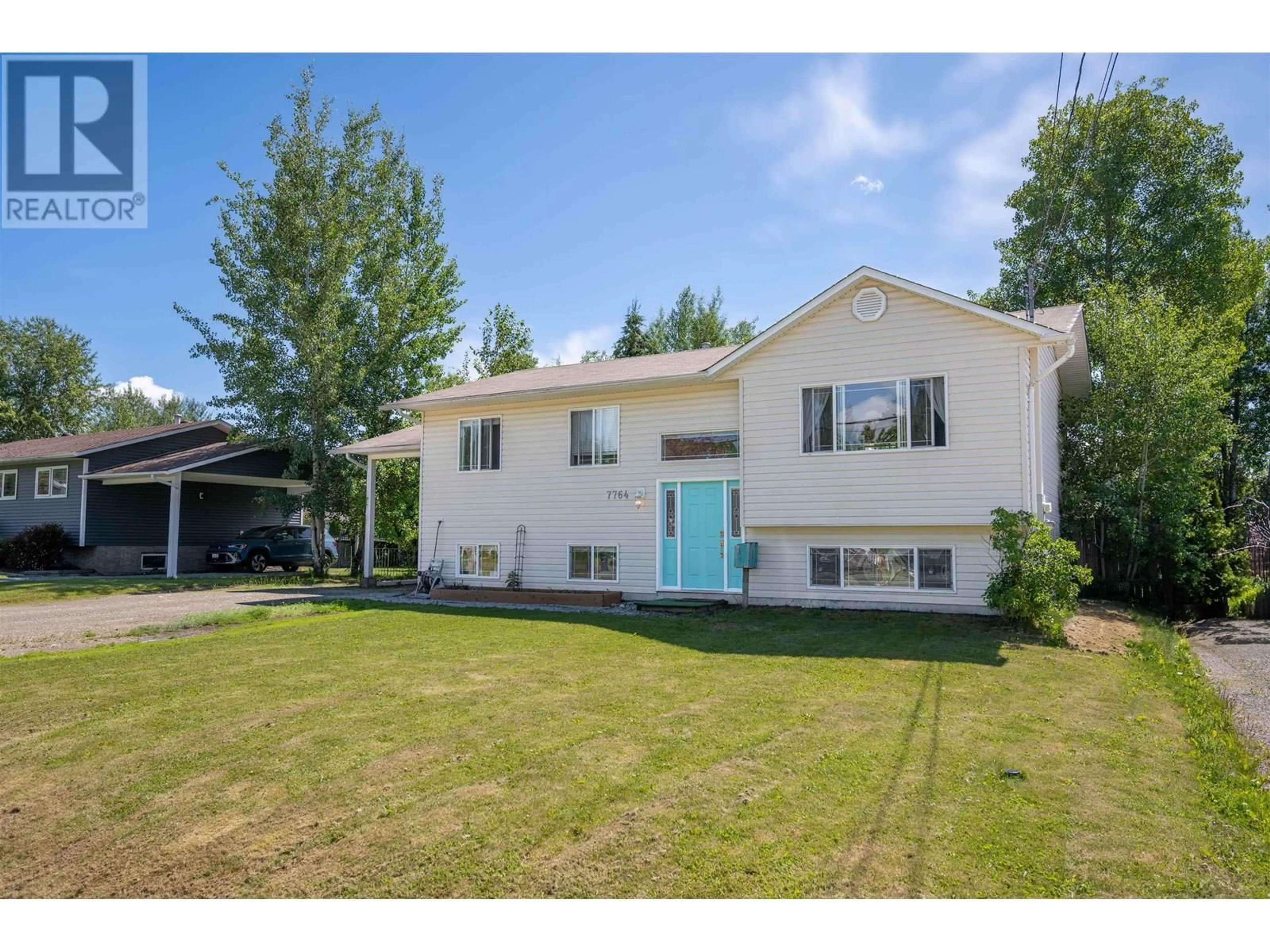 Home with vinyl exterior material, street for 7764 DOW ROAD, Prince George British Columbia V2N5N4