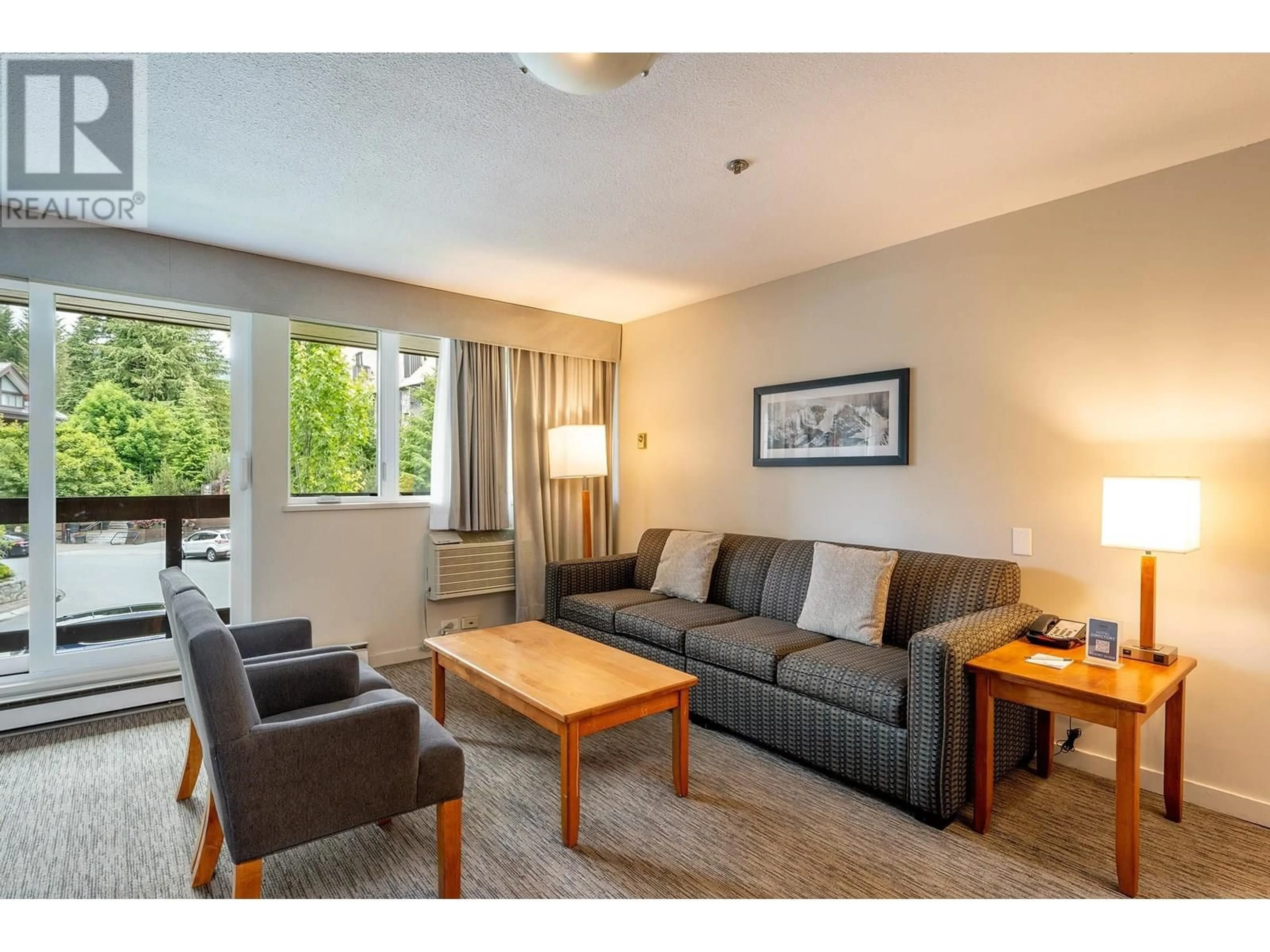 Living room with furniture, wood/laminate floor for 2152 - 4420 SUNDIAL PLACE, Whistler British Columbia V8E1G6