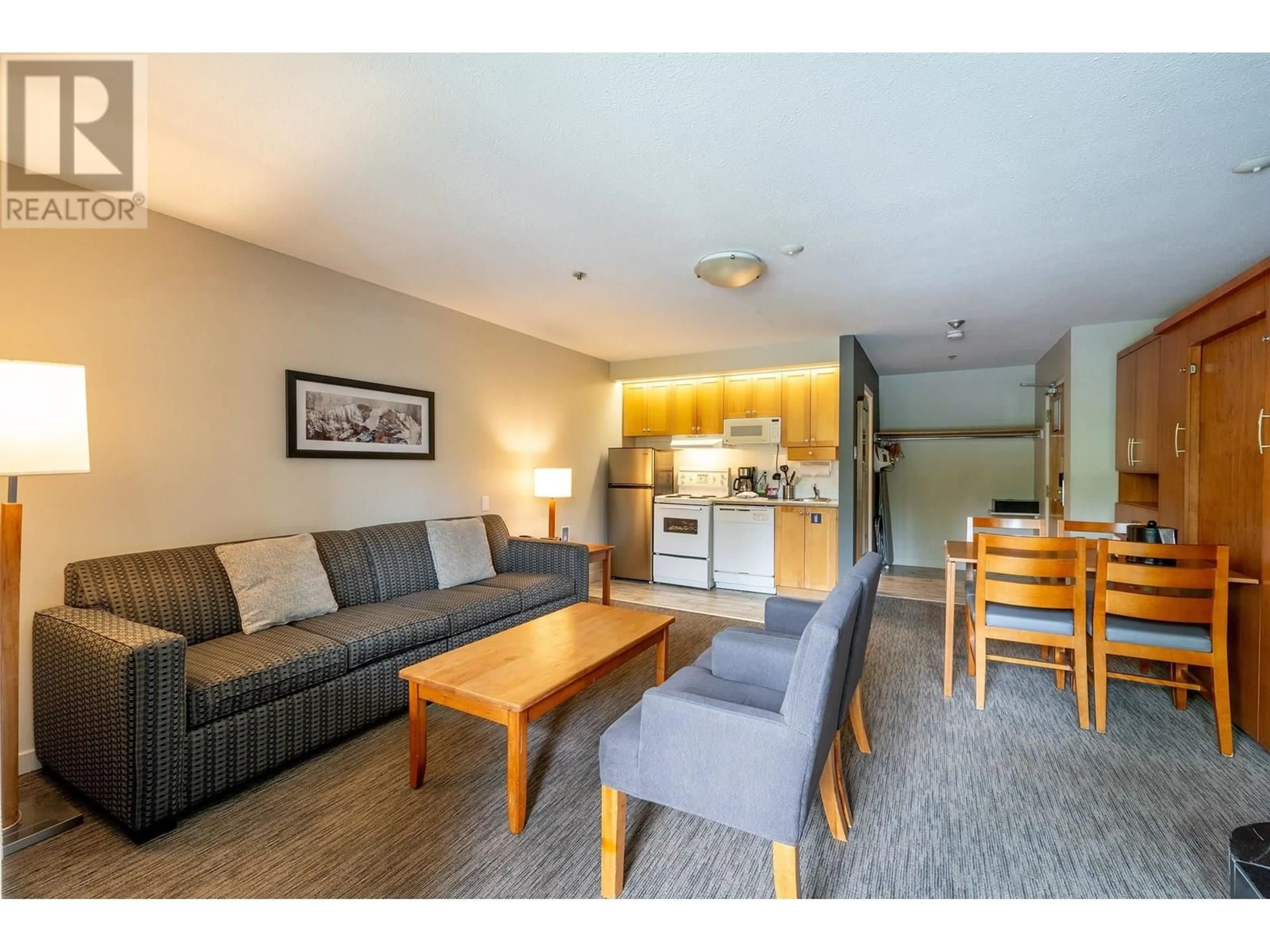 Living room with furniture, wood/laminate floor for 2152 - 4420 SUNDIAL PLACE, Whistler British Columbia V8E1G6