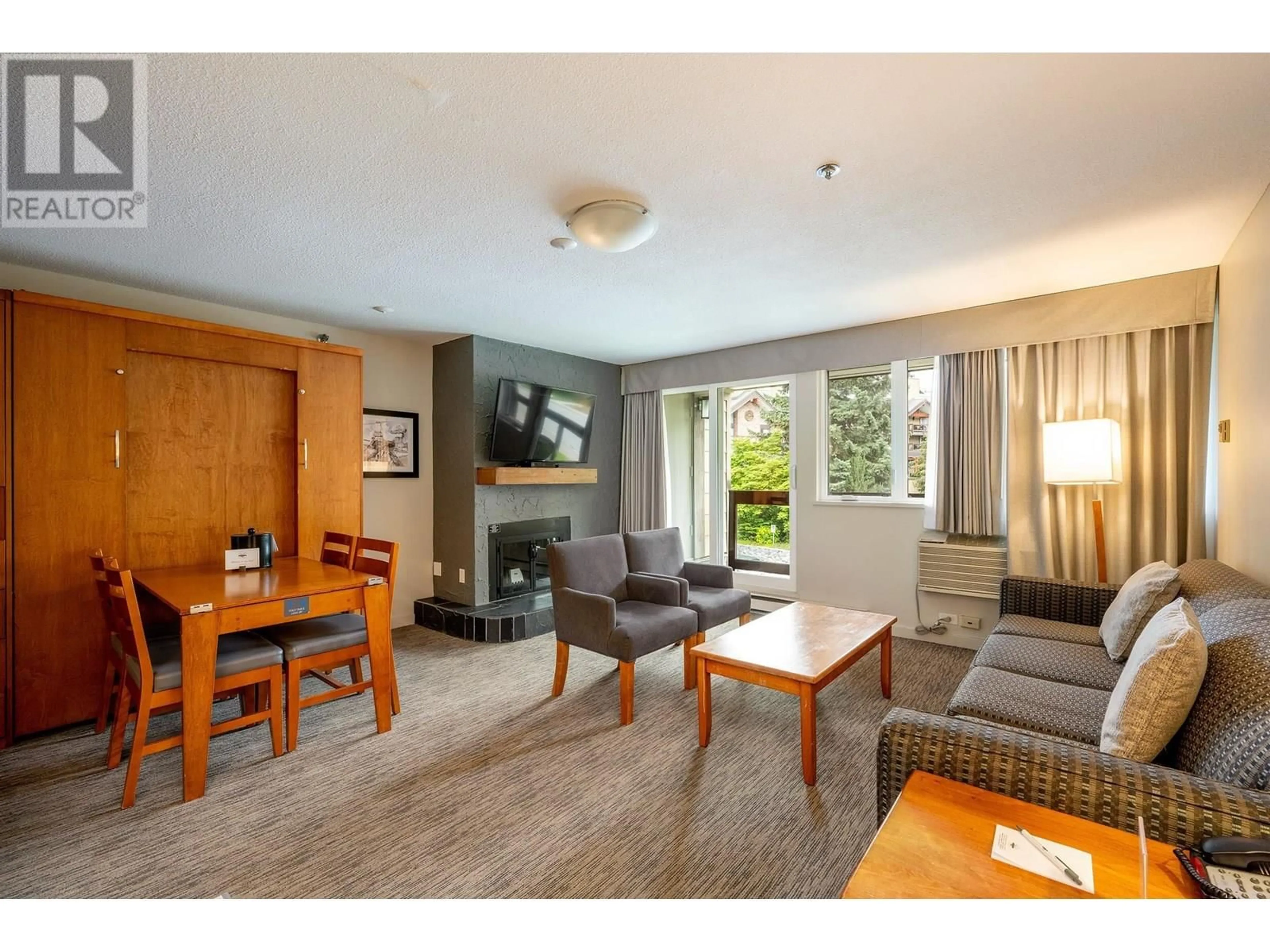 Living room with furniture, wood/laminate floor for 2152 - 4420 SUNDIAL PLACE, Whistler British Columbia V8E1G6