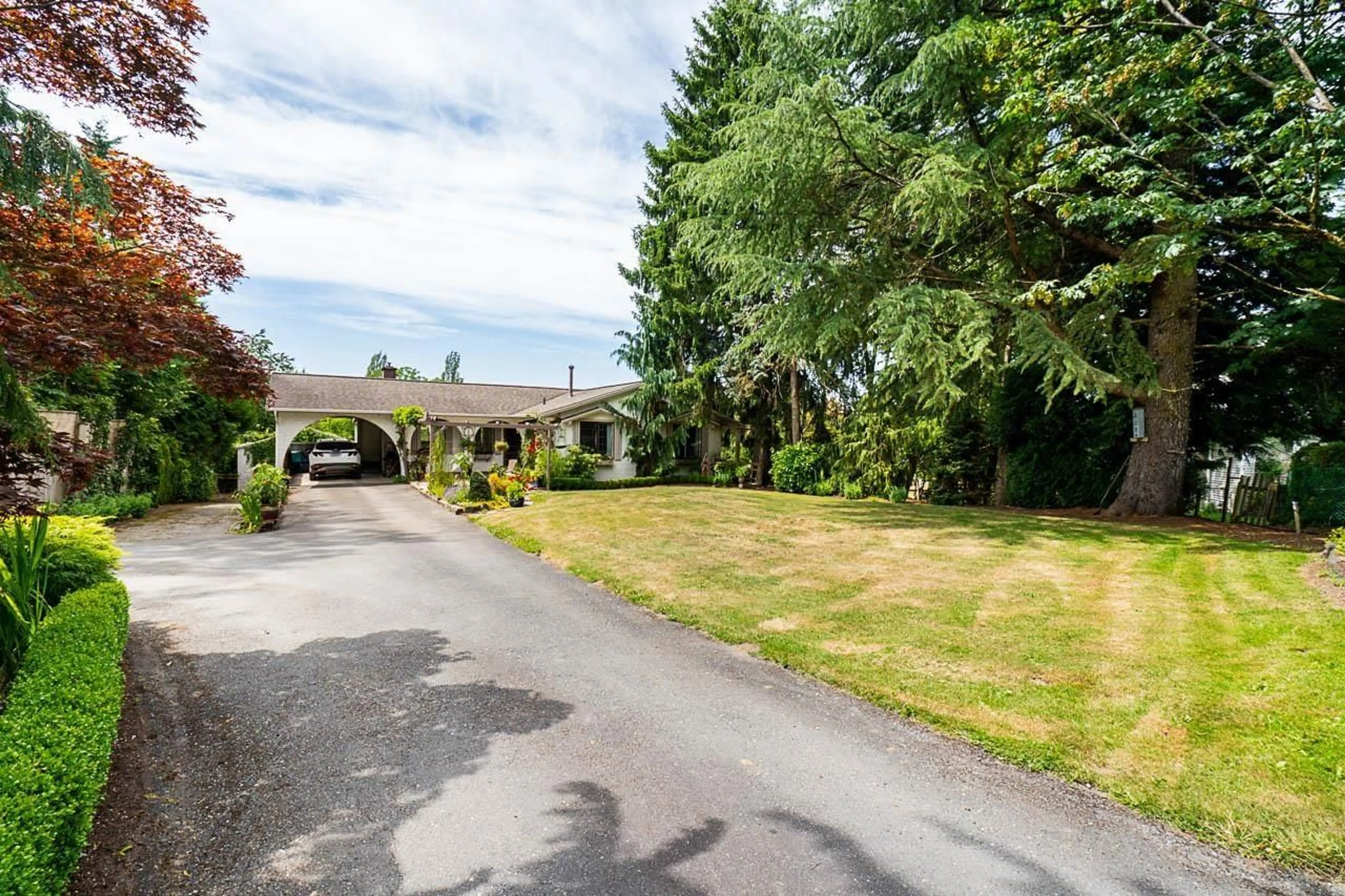 A pic from outside/outdoor area/front of a property/back of a property/a pic from drone, street for 7485 185, Surrey British Columbia V4N6C2