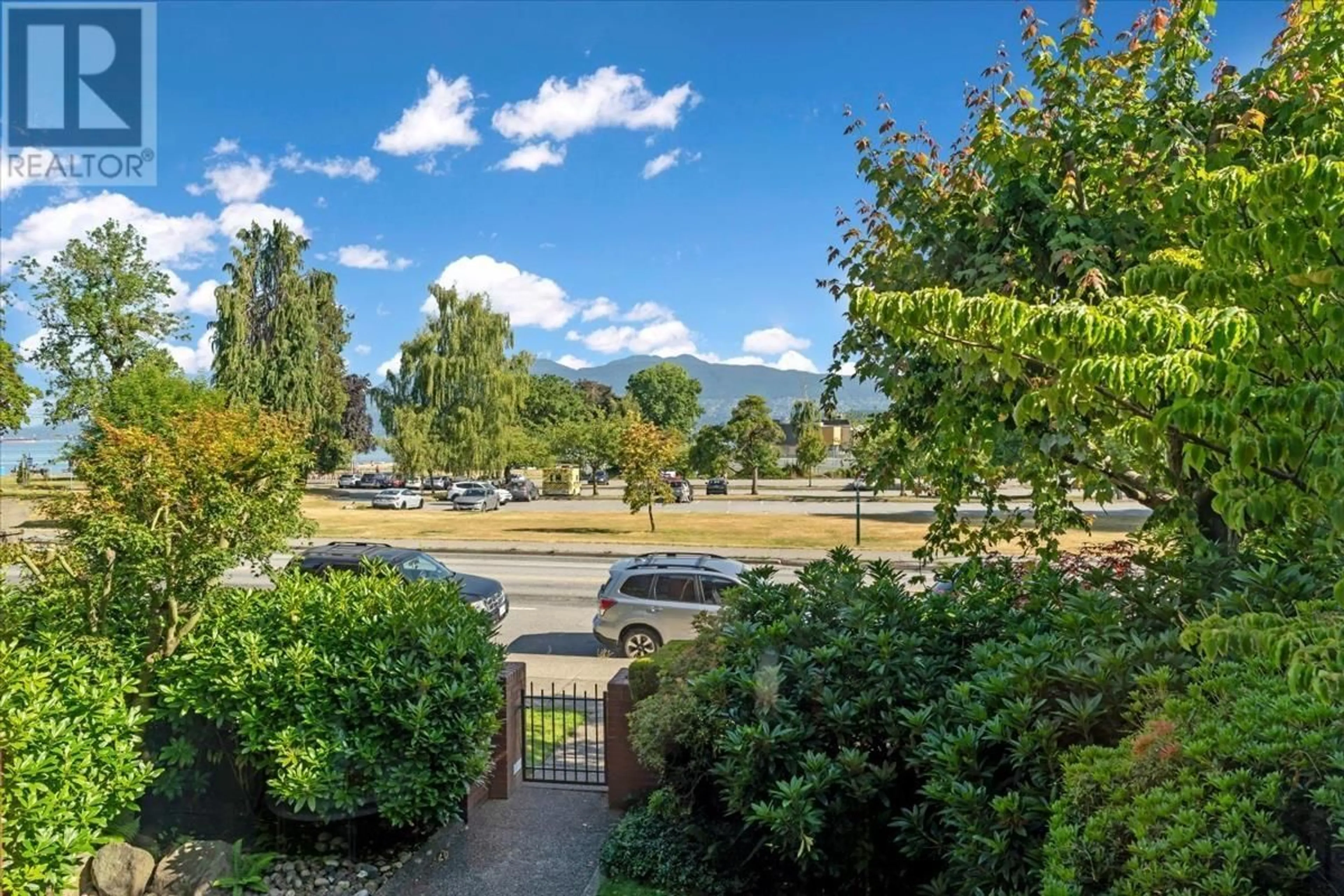 A pic from outside/outdoor area/front of a property/back of a property/a pic from drone, mountain view for 206 - 2160 CORNWALL AVENUE, Vancouver British Columbia V6K1B4