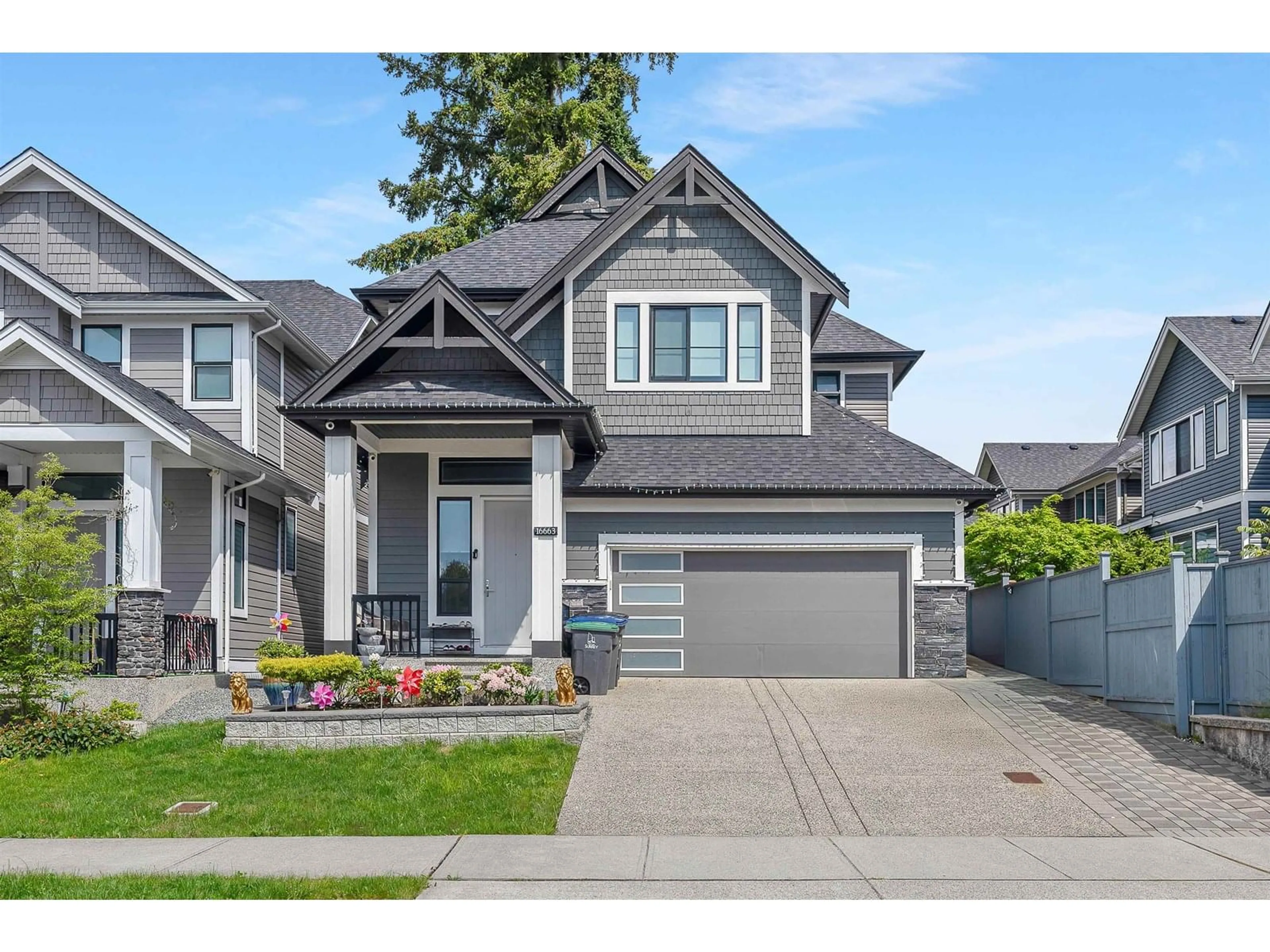 Home with vinyl exterior material, street for 16663 103, Surrey British Columbia V4N1Y8