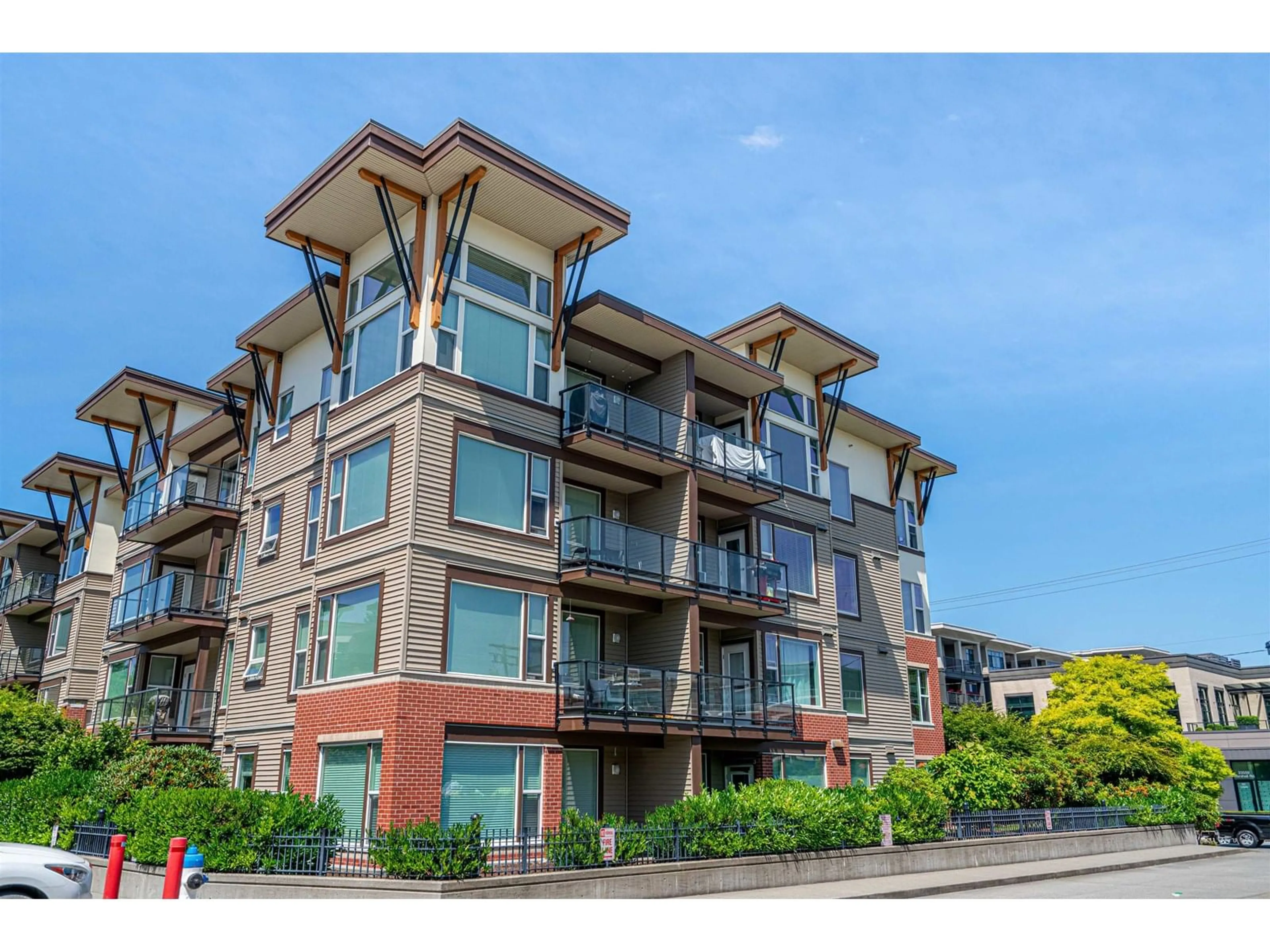 A pic from outside/outdoor area/front of a property/back of a property/a pic from drone, building for 416 - 33538 MARSHALL, Abbotsford British Columbia V2S0C7