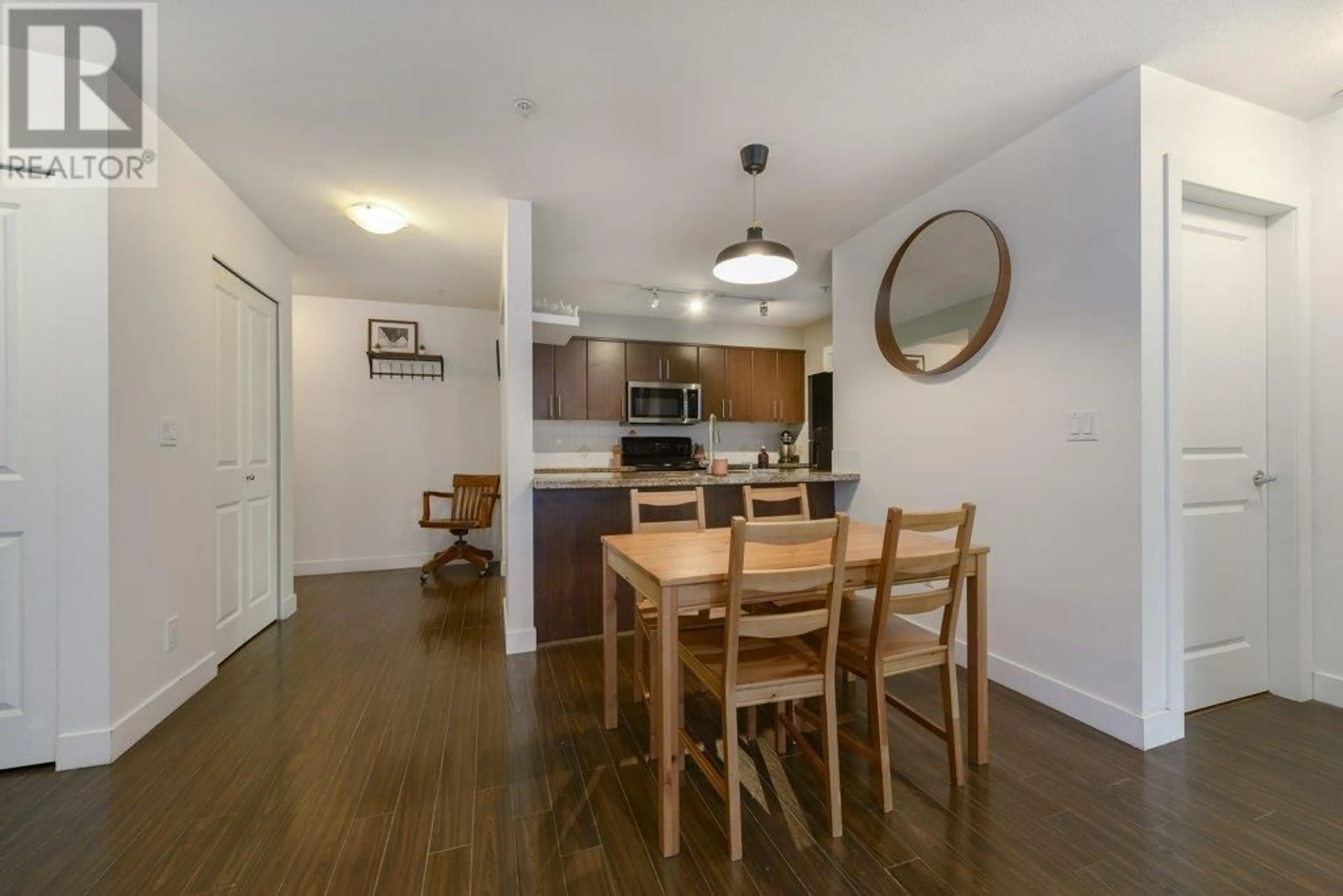 Dining room, wood/laminate floor for 207 - 3240 ST JOHNS STREET, Port Moody British Columbia V3H0C1