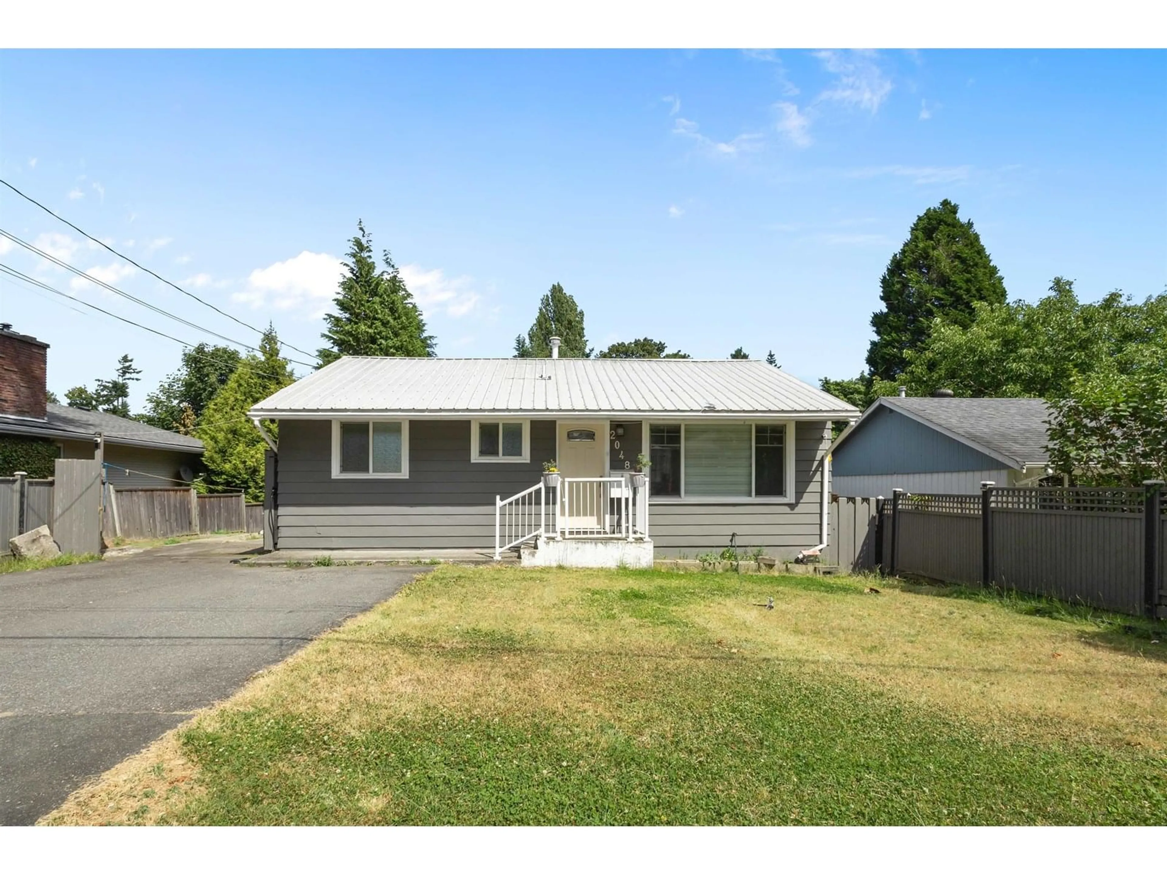 Home with vinyl exterior material, street for 2048 OLIVE, Abbotsford British Columbia V3V0B6