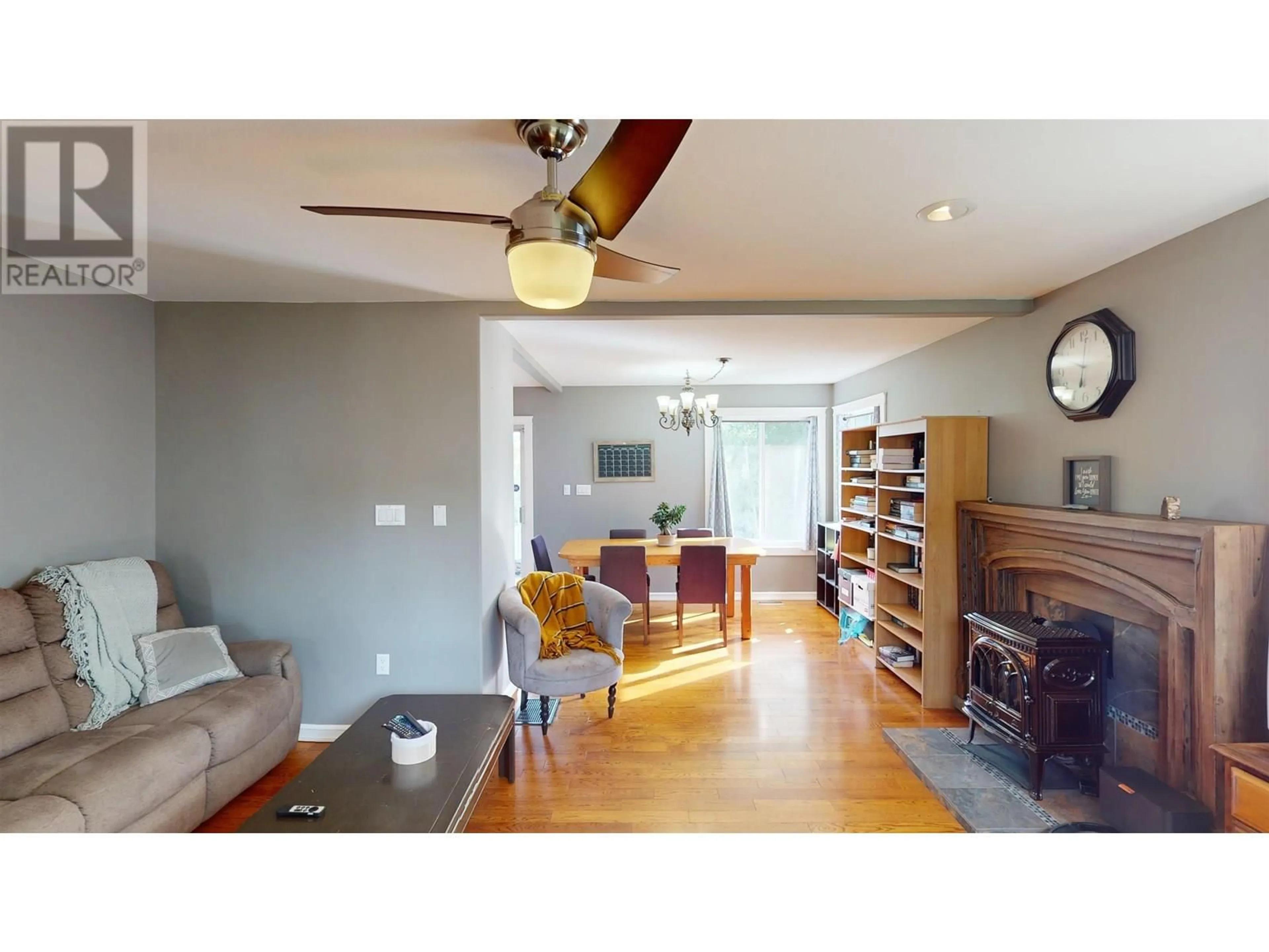 Living room with furniture, wood/laminate floor for 510 DIXON STREET, Quesnel British Columbia V2J5T5