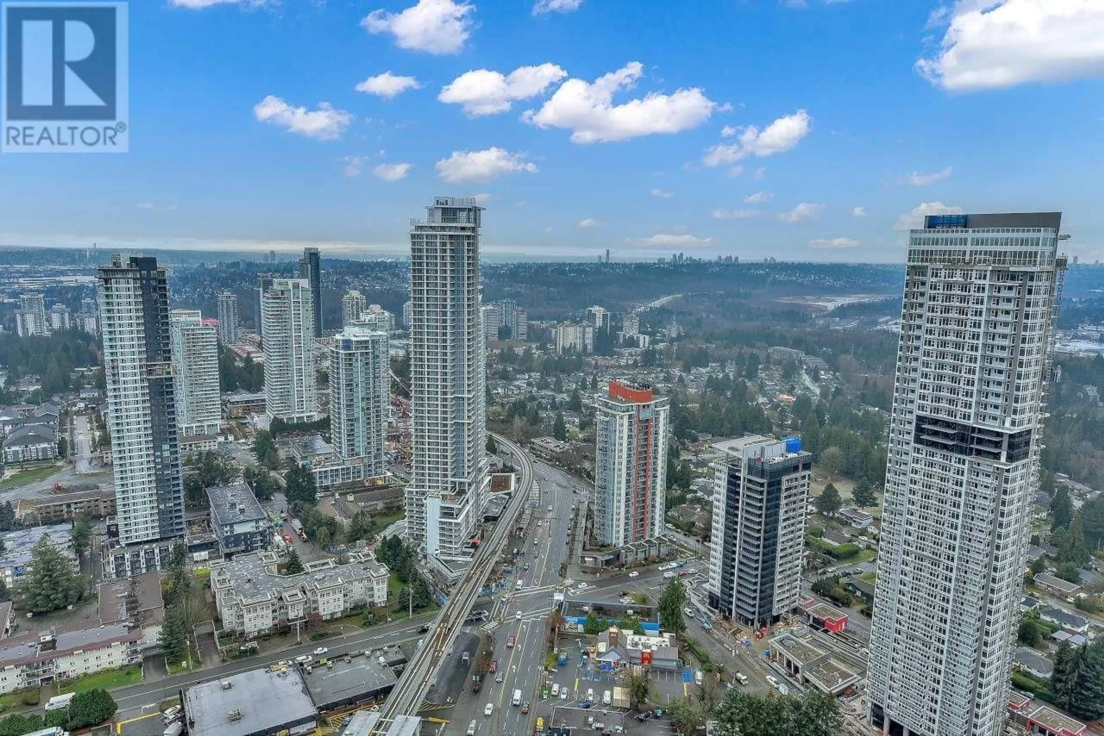 A pic from outside/outdoor area/front of a property/back of a property/a pic from drone, city buildings view from balcony for 4307 - 567 CLARKE ROAD, Coquitlam British Columbia V3J3Y2