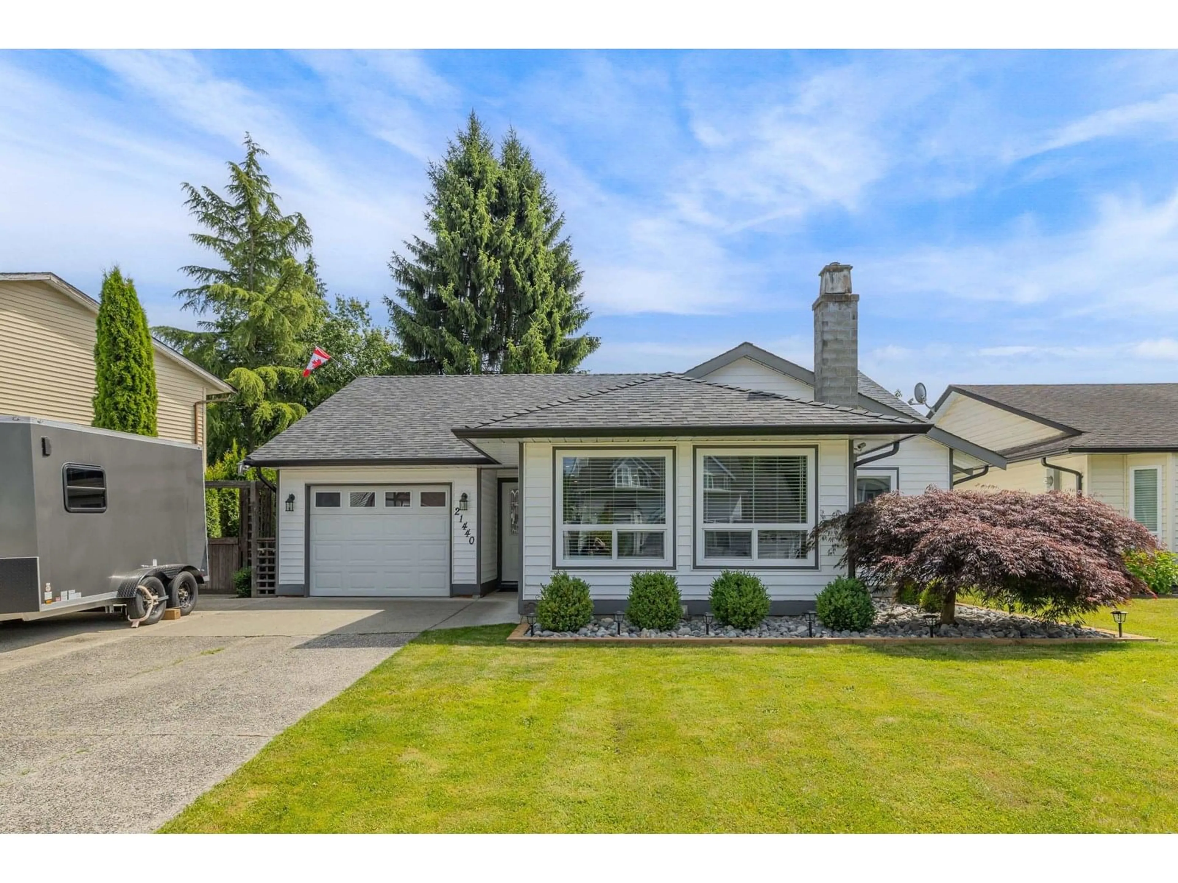 Home with vinyl exterior material, street for 21440 95, Langley British Columbia V1M1W5