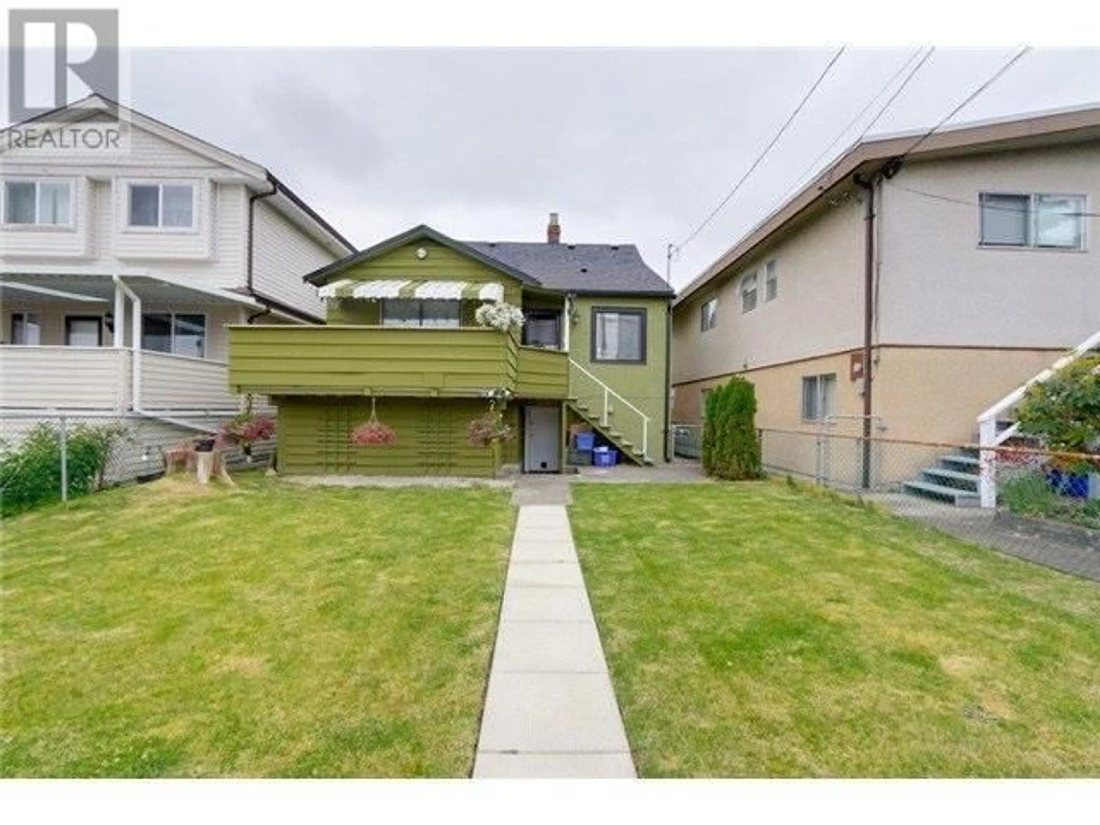 A pic from outside/outdoor area/front of a property/back of a property/a pic from drone, street for 1942 49TH AVENUE, Vancouver British Columbia V5P1T3