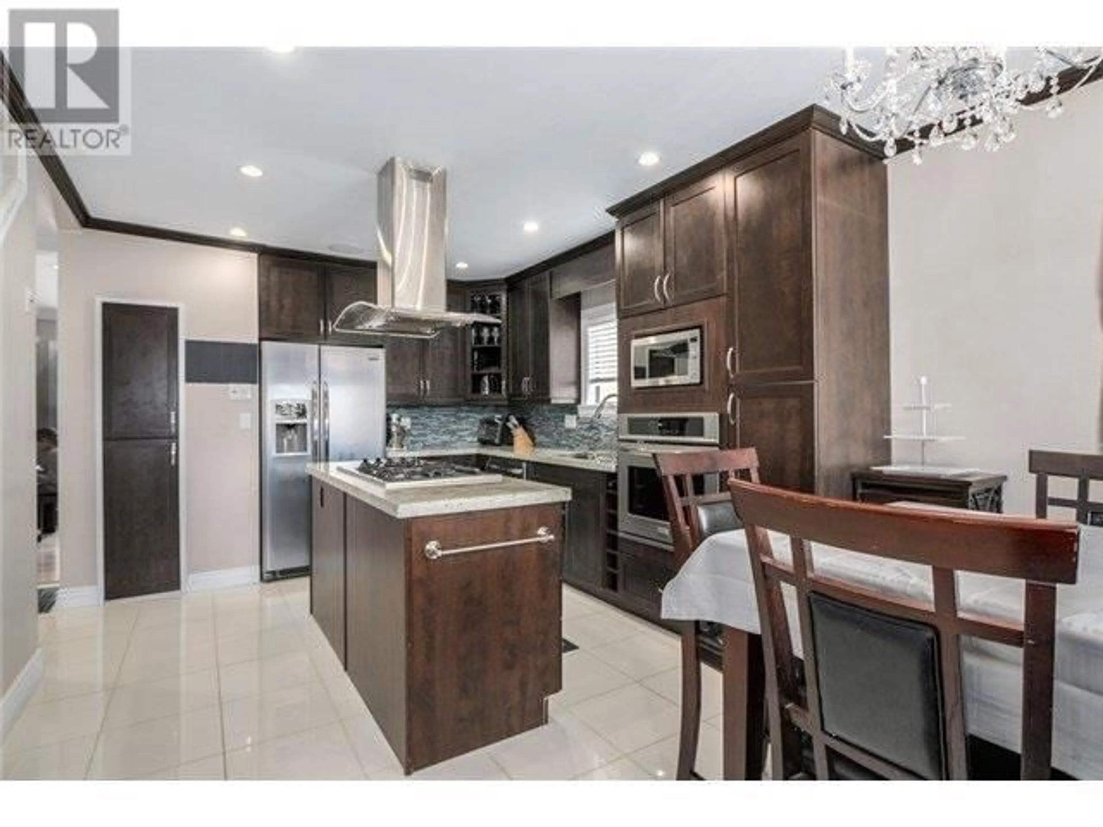 Open concept kitchen, unknown for 1942 49TH AVENUE, Vancouver British Columbia V5P1T3