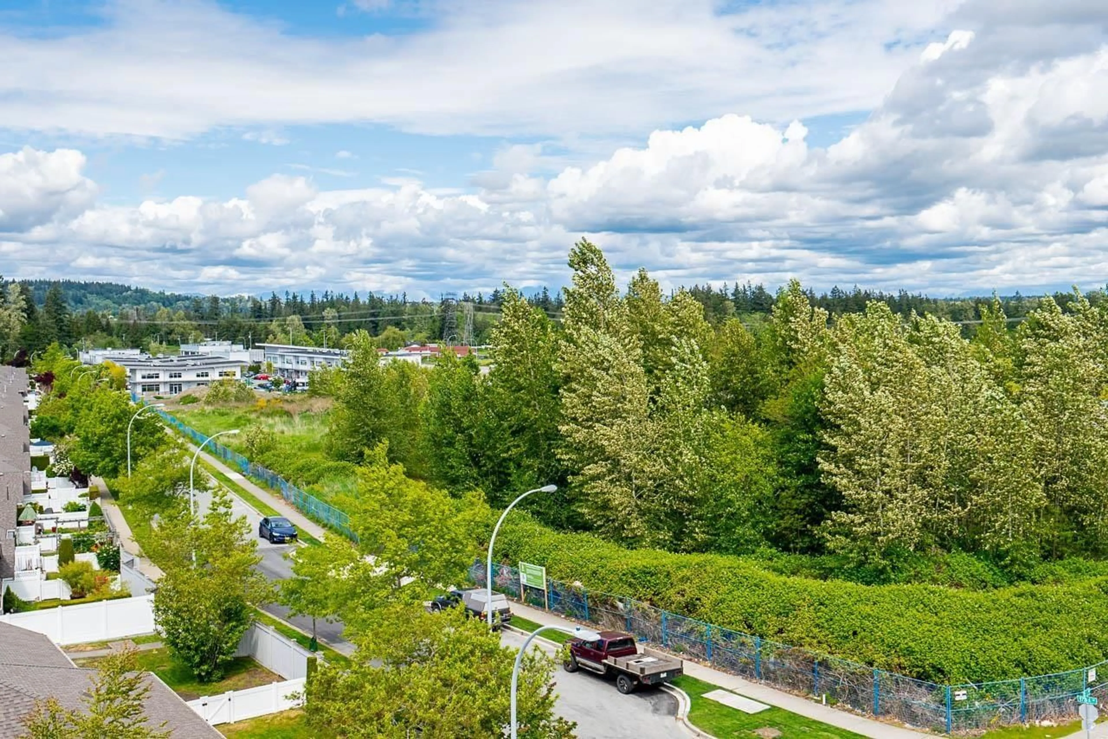 A pic from outside/outdoor area/front of a property/back of a property/a pic from drone, unknown for 213 - 163 175A, Surrey British Columbia V0V0V0