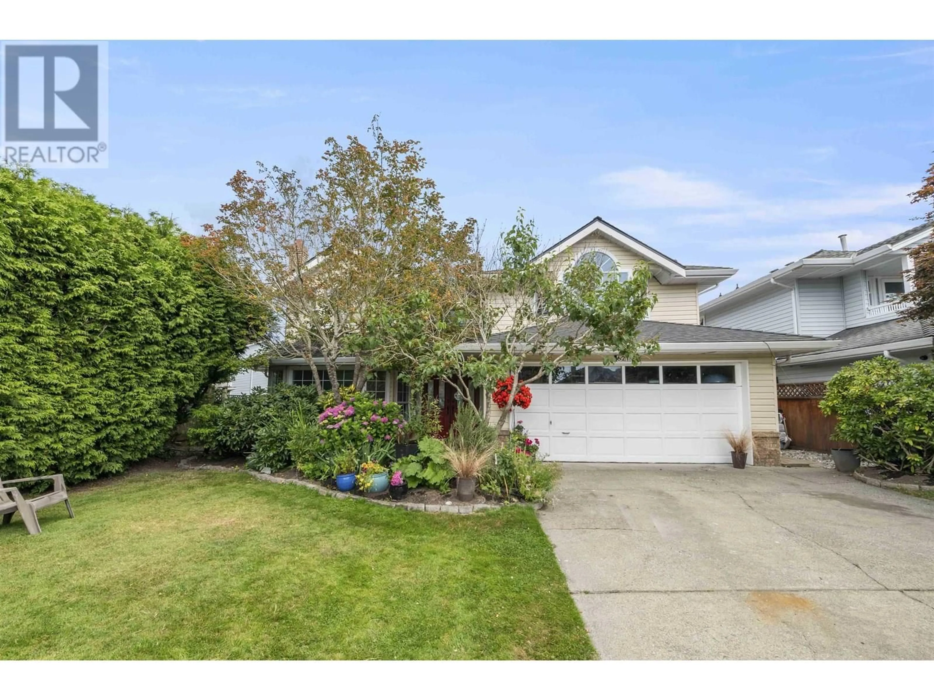 Home with vinyl exterior material, street for 6211 49 AVENUE, Ladner British Columbia V4K4S5