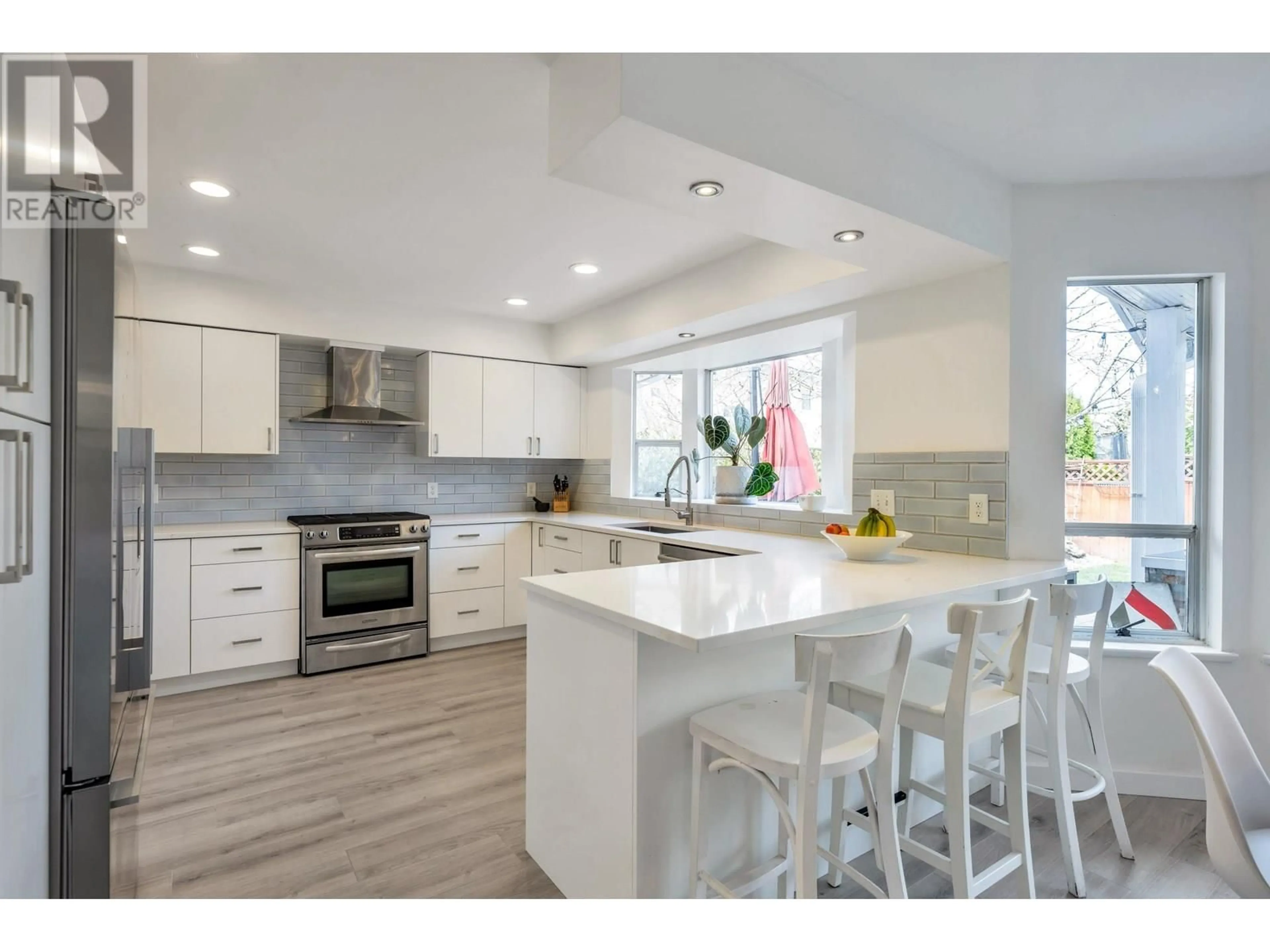 Open concept kitchen, ceramic/tile floor for 6211 49 AVENUE, Ladner British Columbia V4K4S5
