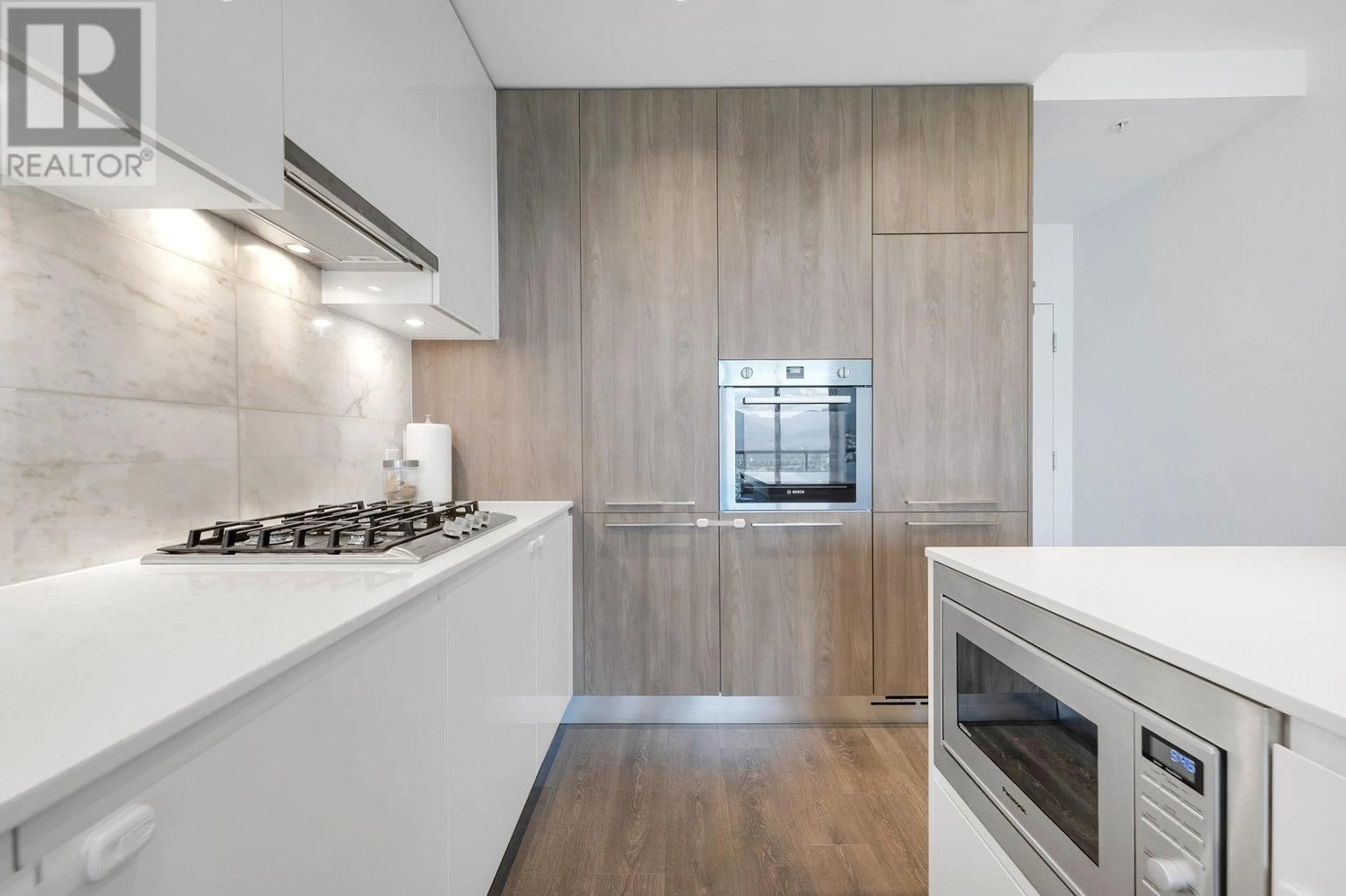 Contemporary kitchen, wood/laminate floor for 3111 - 1955 ALPHA WAY, Burnaby British Columbia V5C0K6