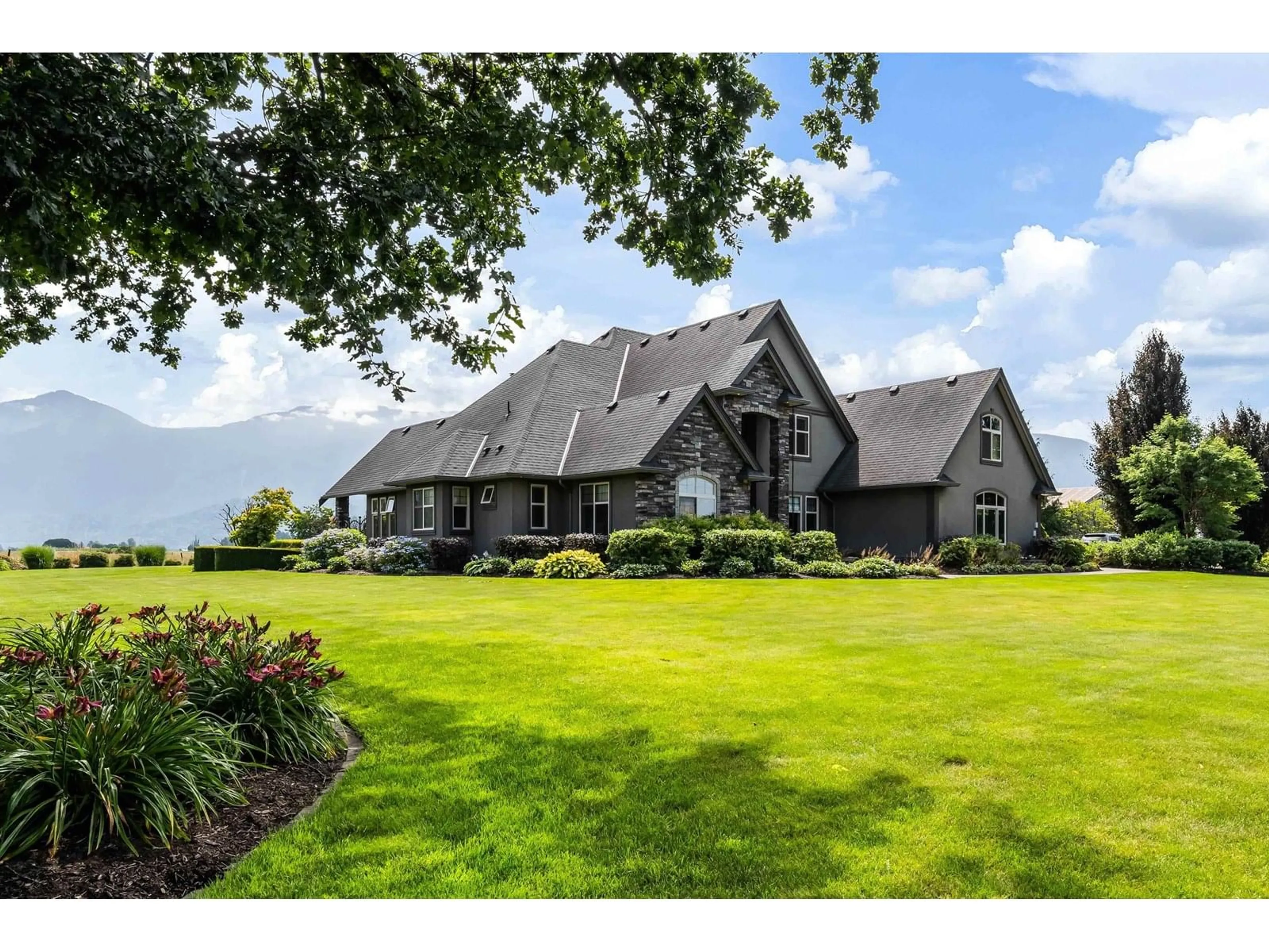 A pic from outside/outdoor area/front of a property/back of a property/a pic from drone, mountain view for 9338 GIBSON ROAD, Chilliwack British Columbia V2P6H4