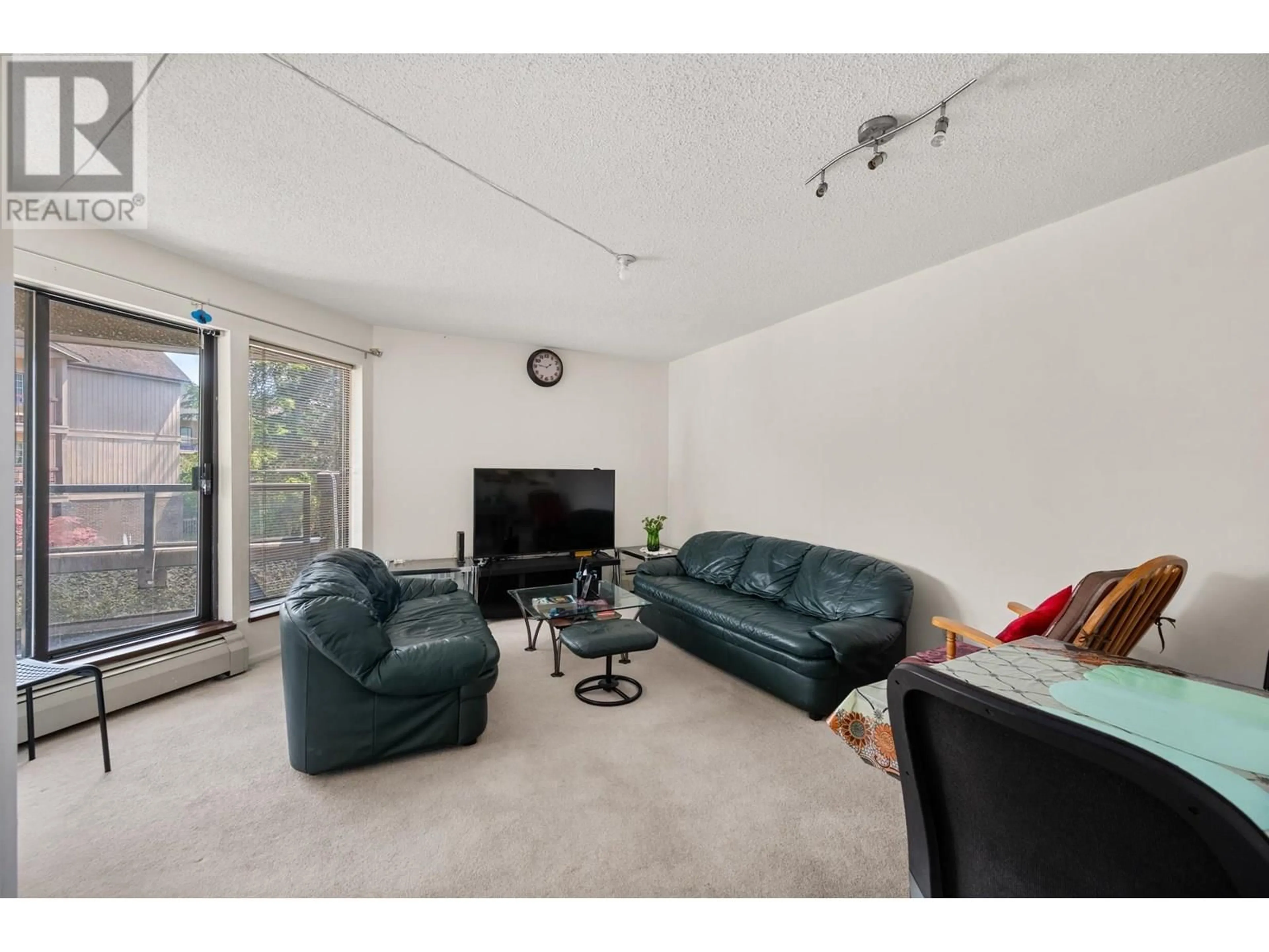 Living room with furniture, unknown for 231 - 8460 ACKROYD ROAD, Richmond British Columbia V6X3B9