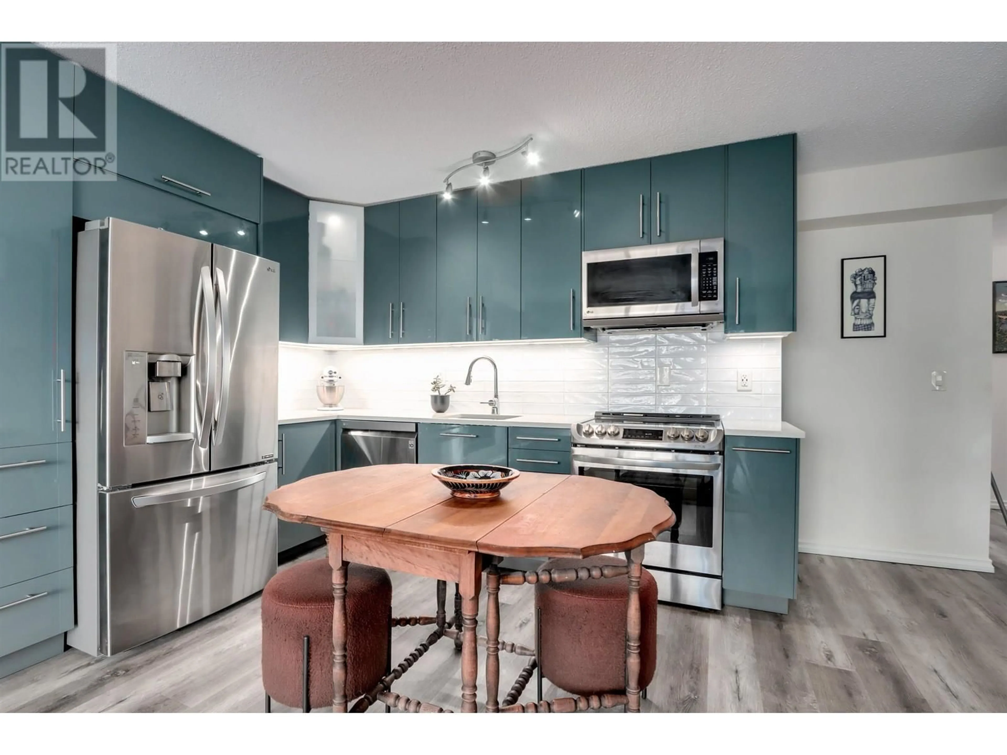 Open concept kitchen, unknown for 203 - 1429 WILLIAM STREET, Vancouver British Columbia V5L4W8