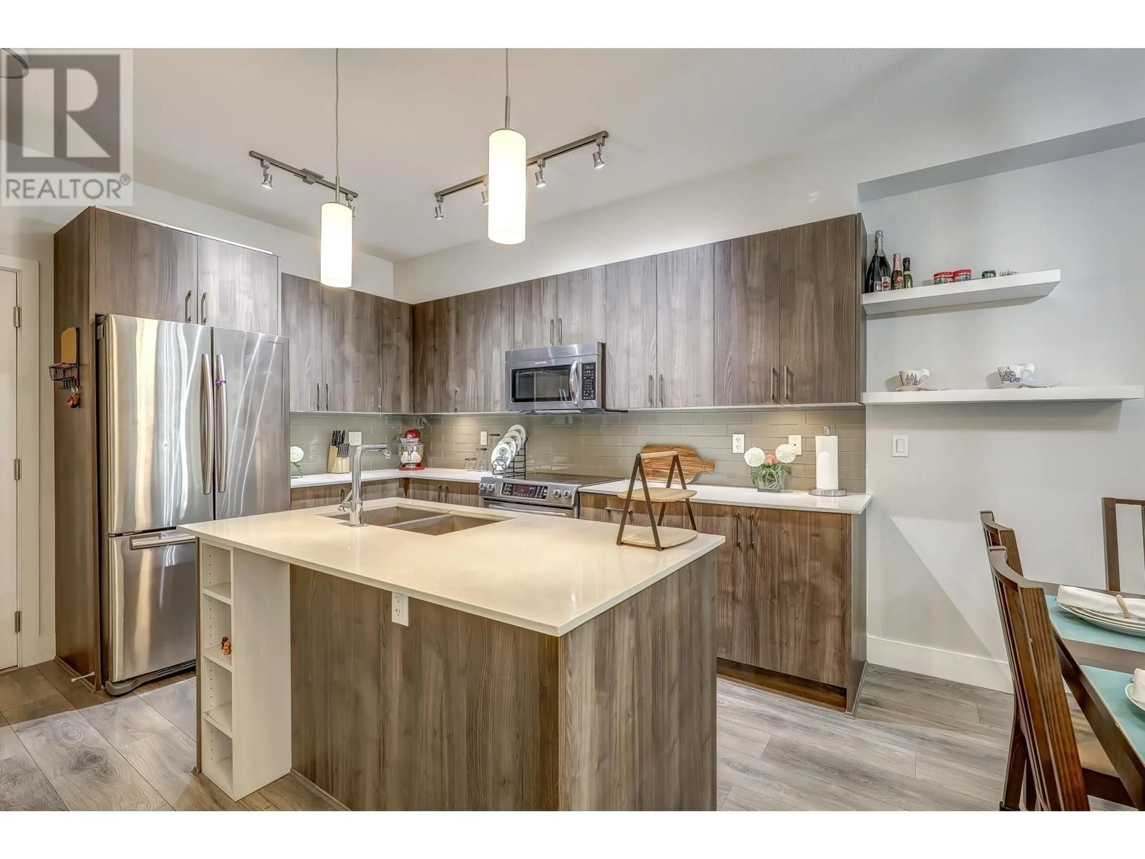 Open concept kitchen, unknown for 103 - 630 COMO LAKE AVENUE, Coquitlam British Columbia V3J0E4
