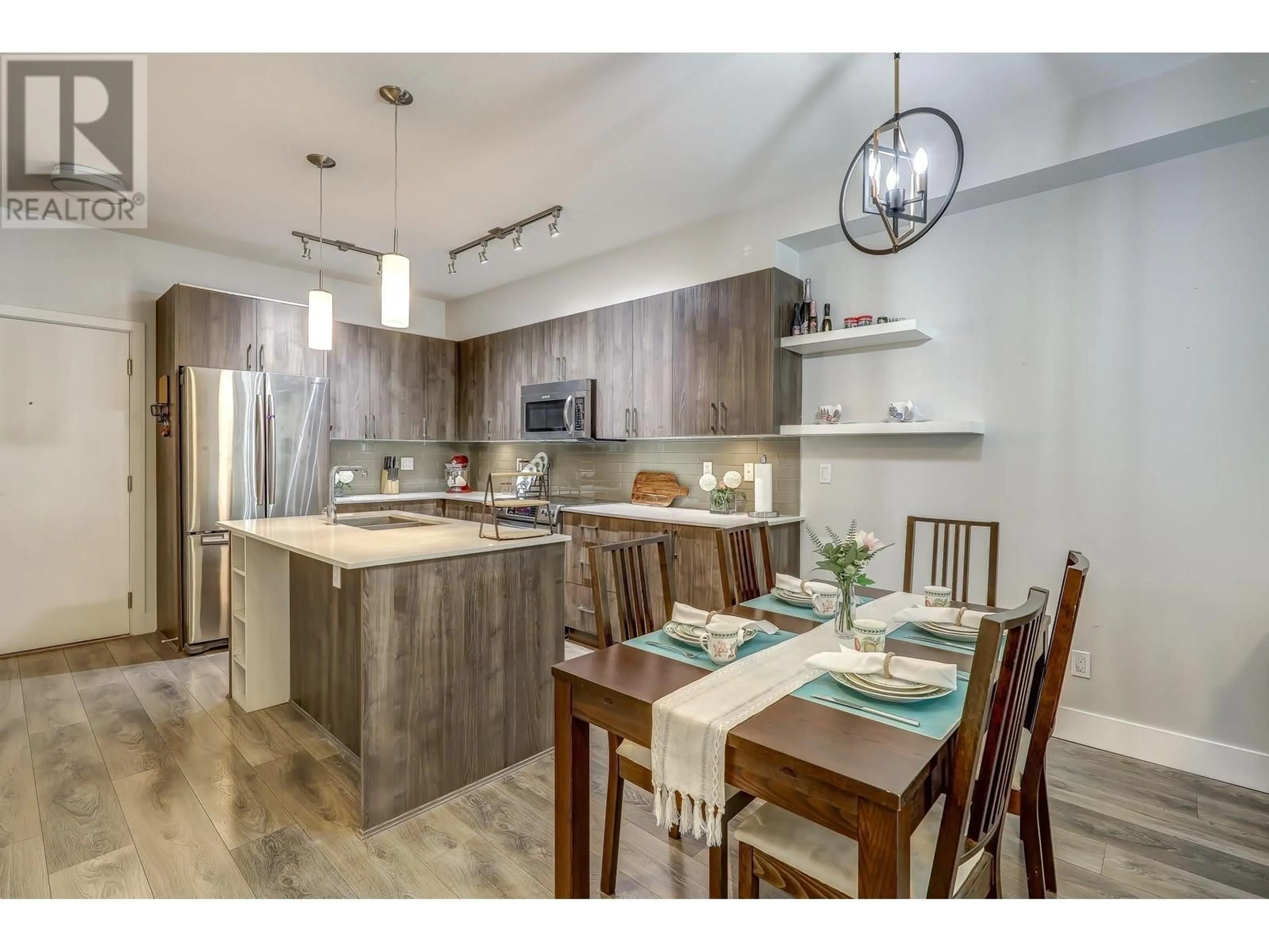 Open concept kitchen, unknown for 103 - 630 COMO LAKE AVENUE, Coquitlam British Columbia V3J0E4