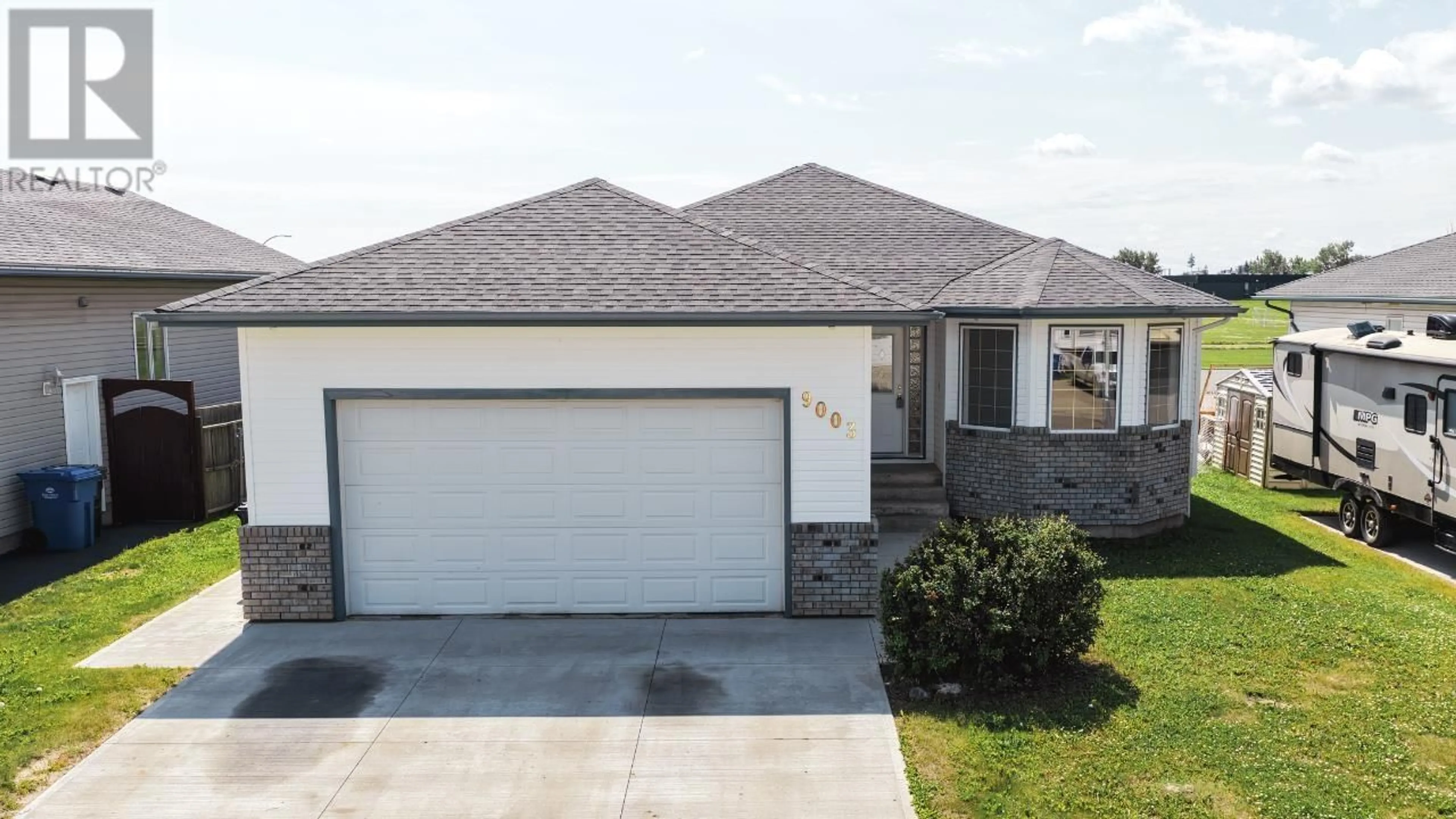 Home with vinyl exterior material, street for 9003 111 AVENUE, Fort St. John British Columbia V1J6Z2