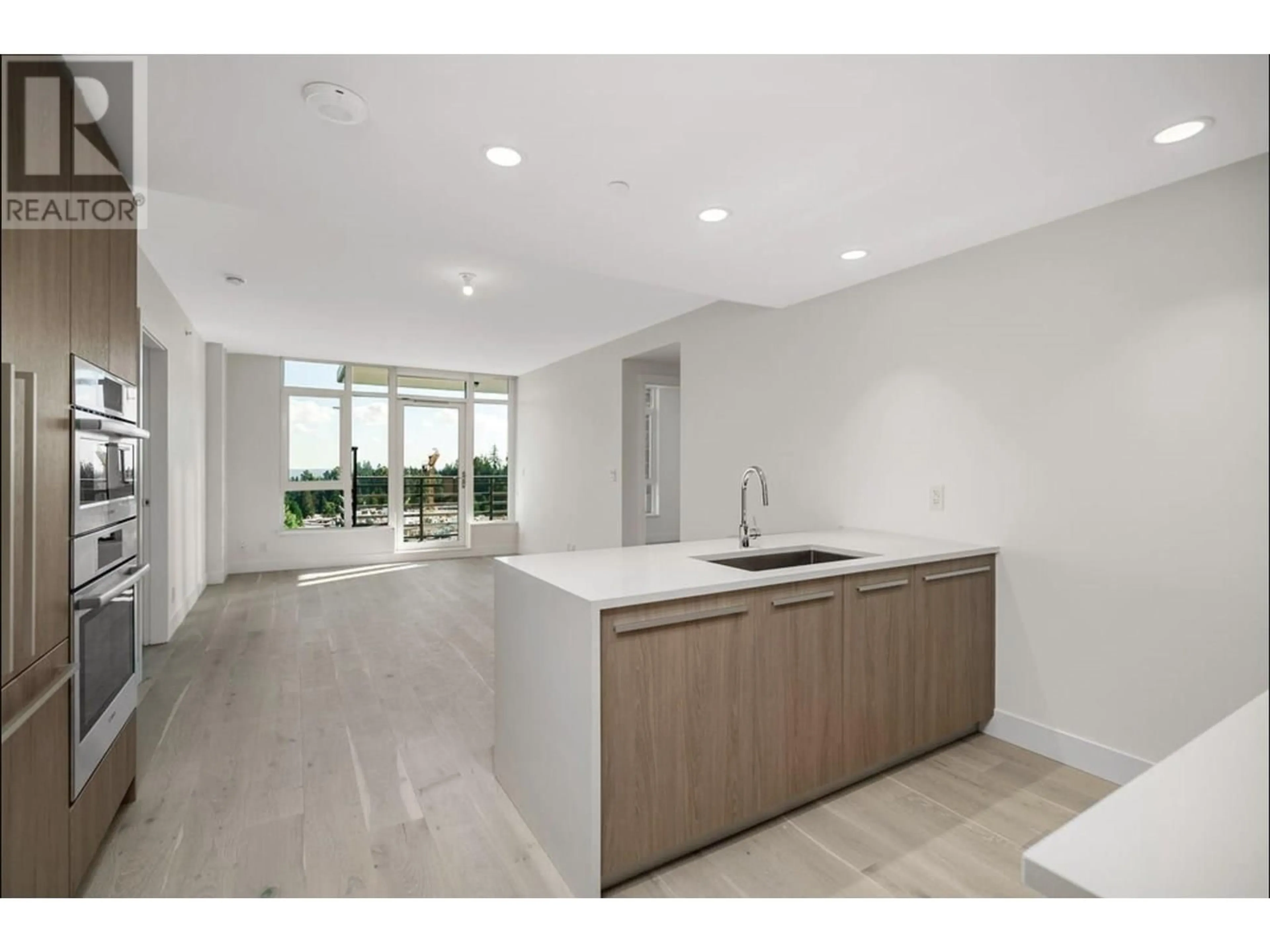 Open concept kitchen, unknown for 907 - 2785 LIBRARY LANE, North Vancouver British Columbia V7J0C3