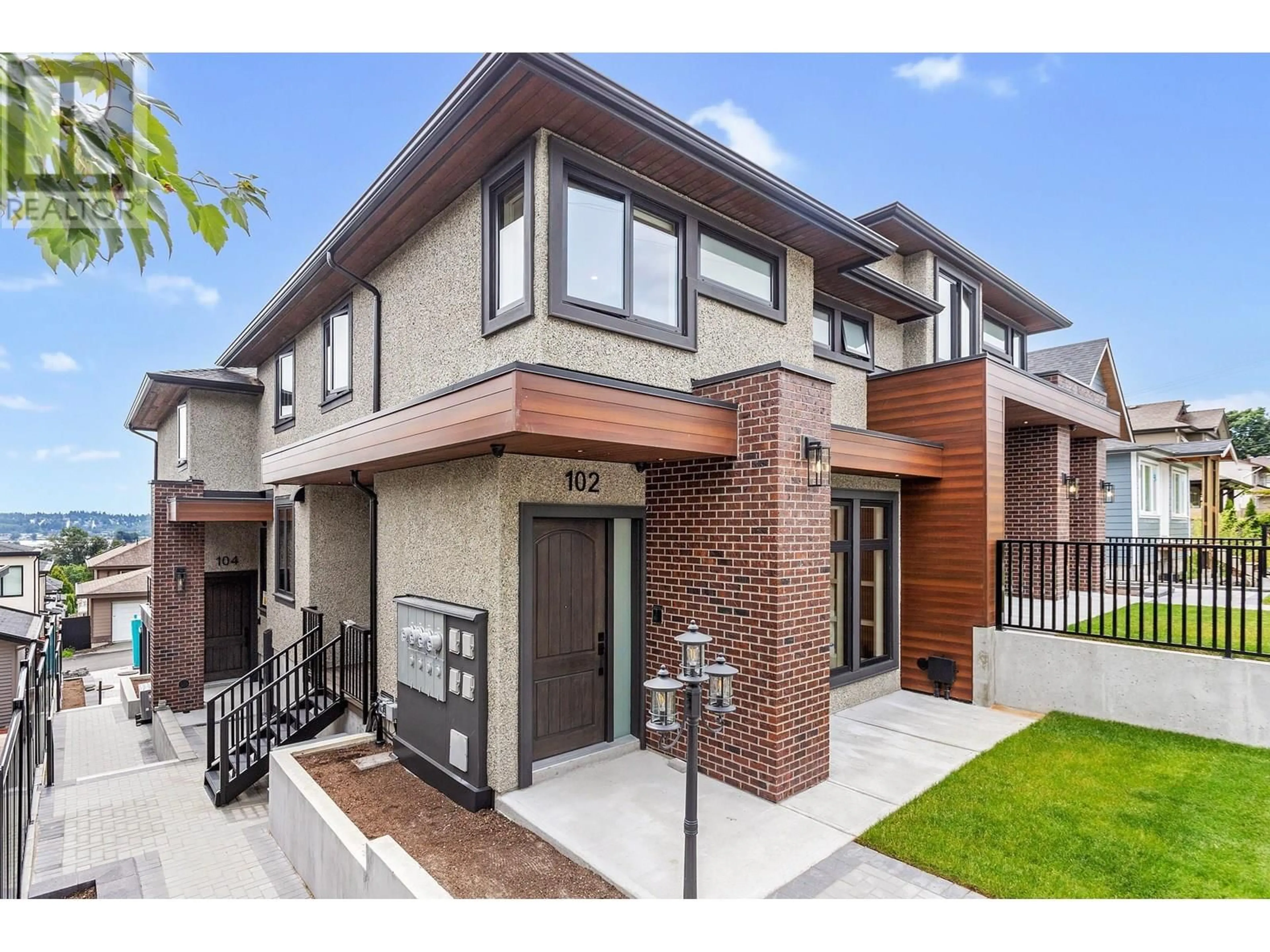 Home with brick exterior material, street for 102 - 1038 DELESTRE AVENUE, Coquitlam British Columbia V3K2H2