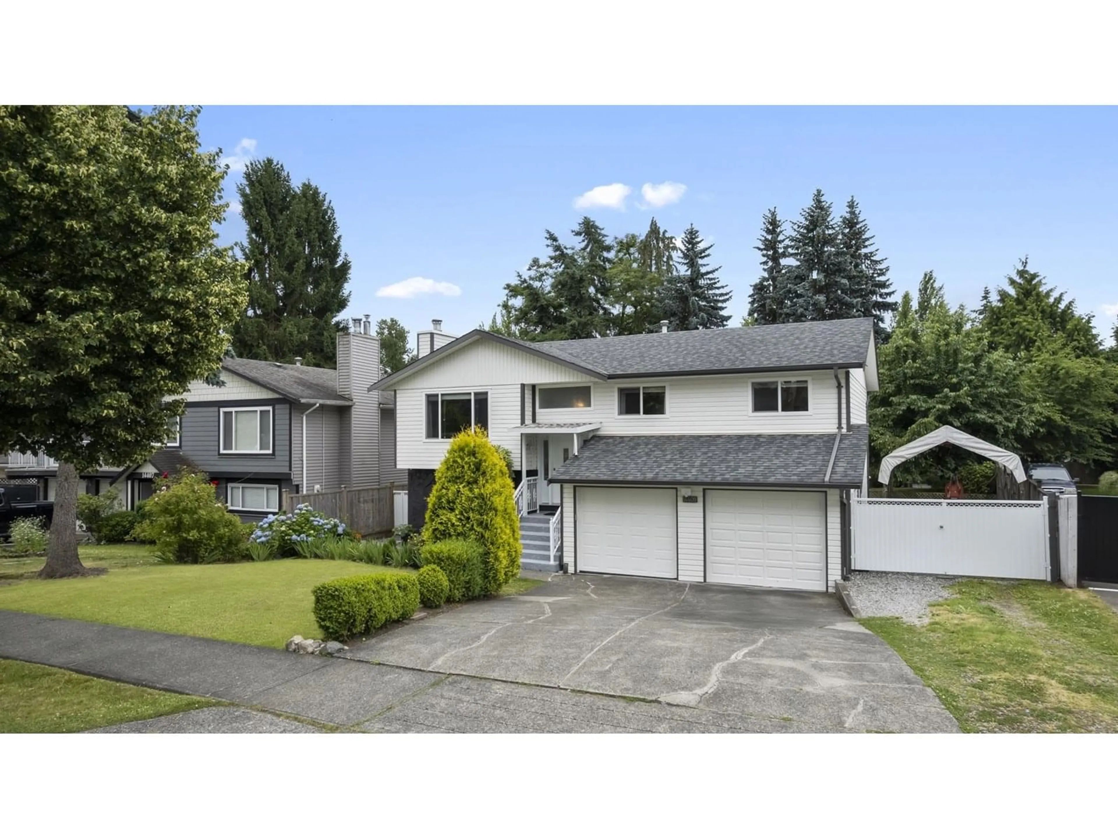 Home with vinyl exterior material, street for 14409 CHARTWELL, Surrey British Columbia V3S5E1