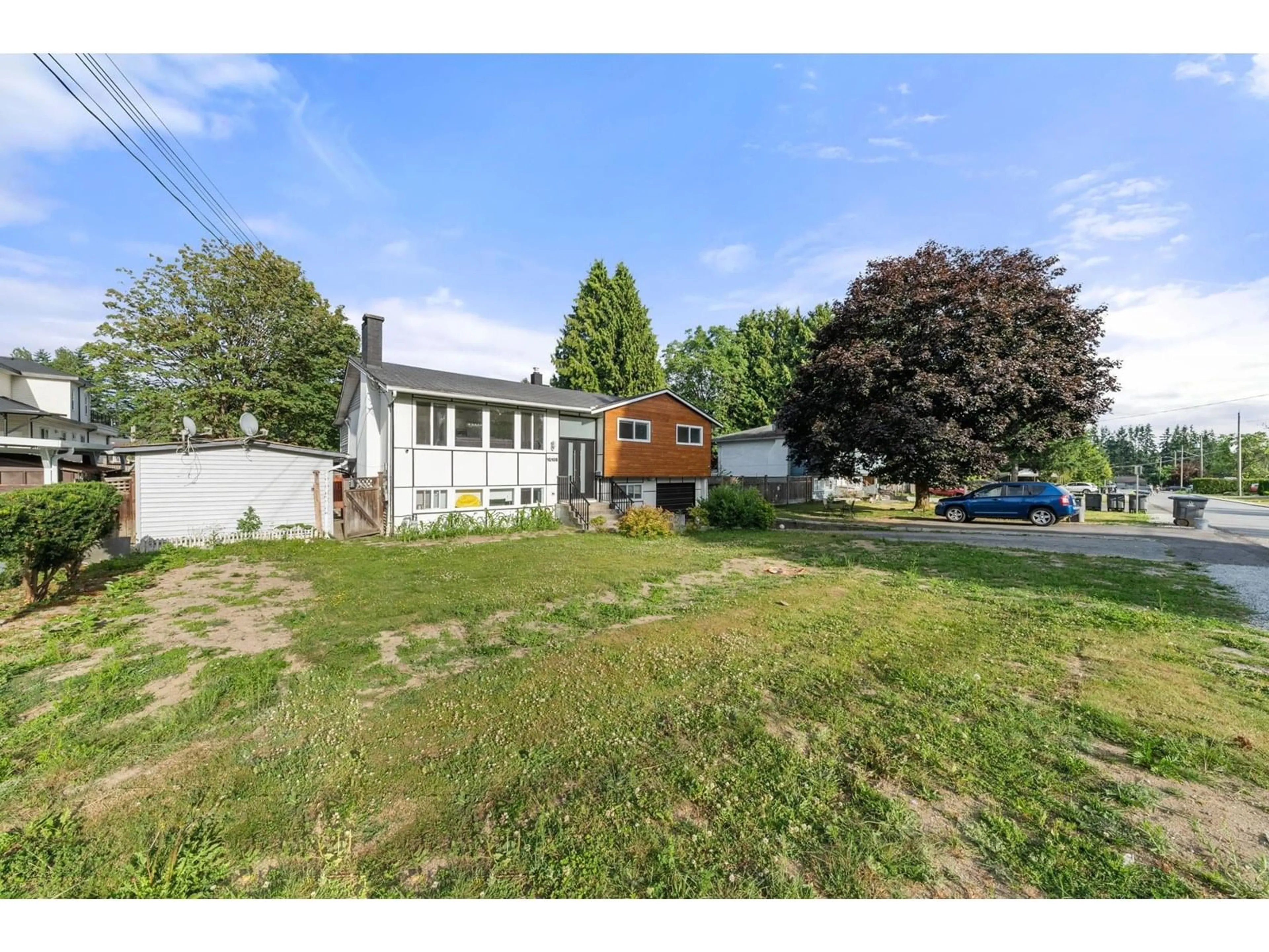 A pic from outside/outdoor area/front of a property/back of a property/a pic from drone, street for 10108 127A, Surrey British Columbia V3V5L3