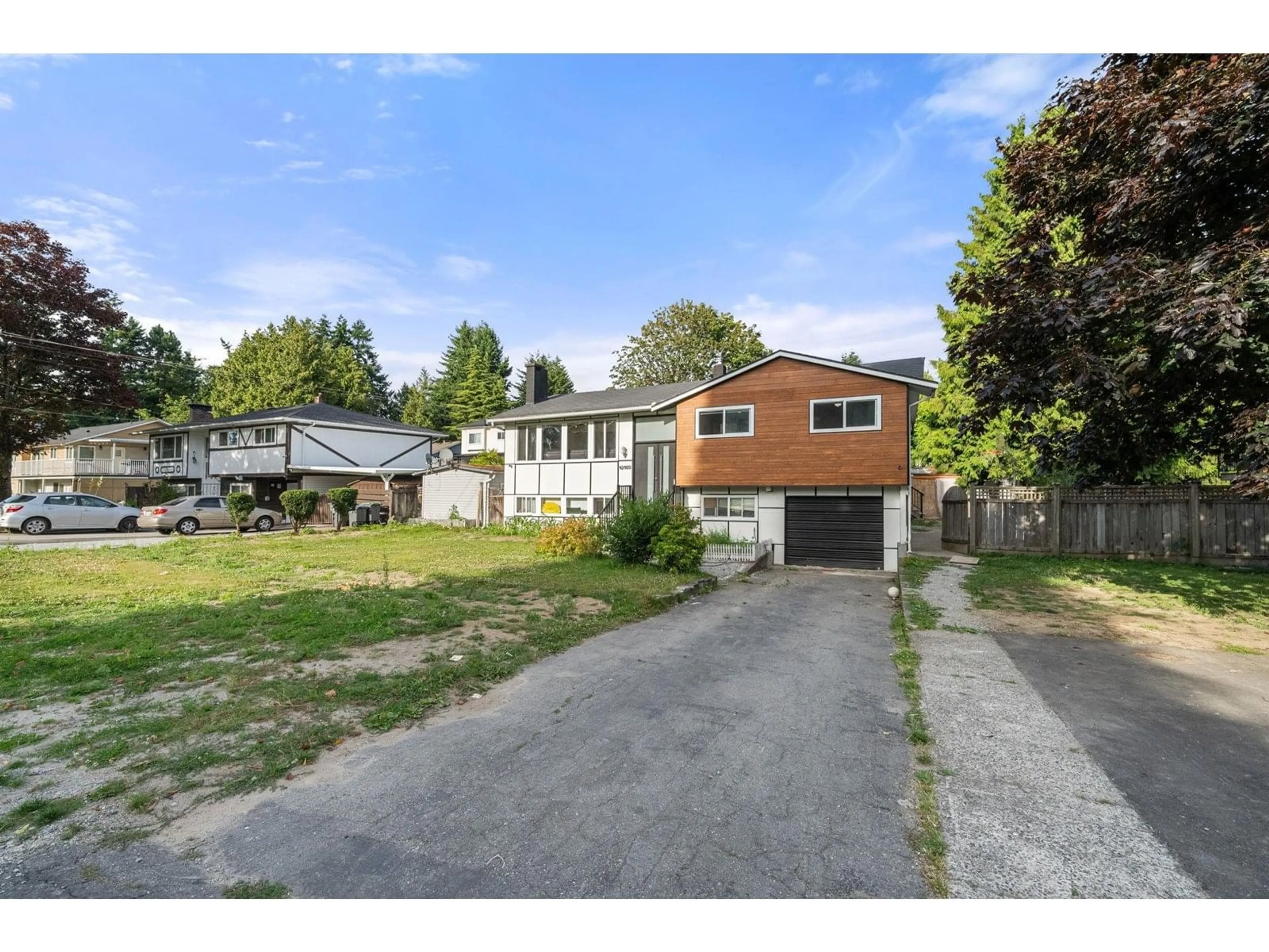 A pic from outside/outdoor area/front of a property/back of a property/a pic from drone, street for 10108 127A, Surrey British Columbia V3V5L3