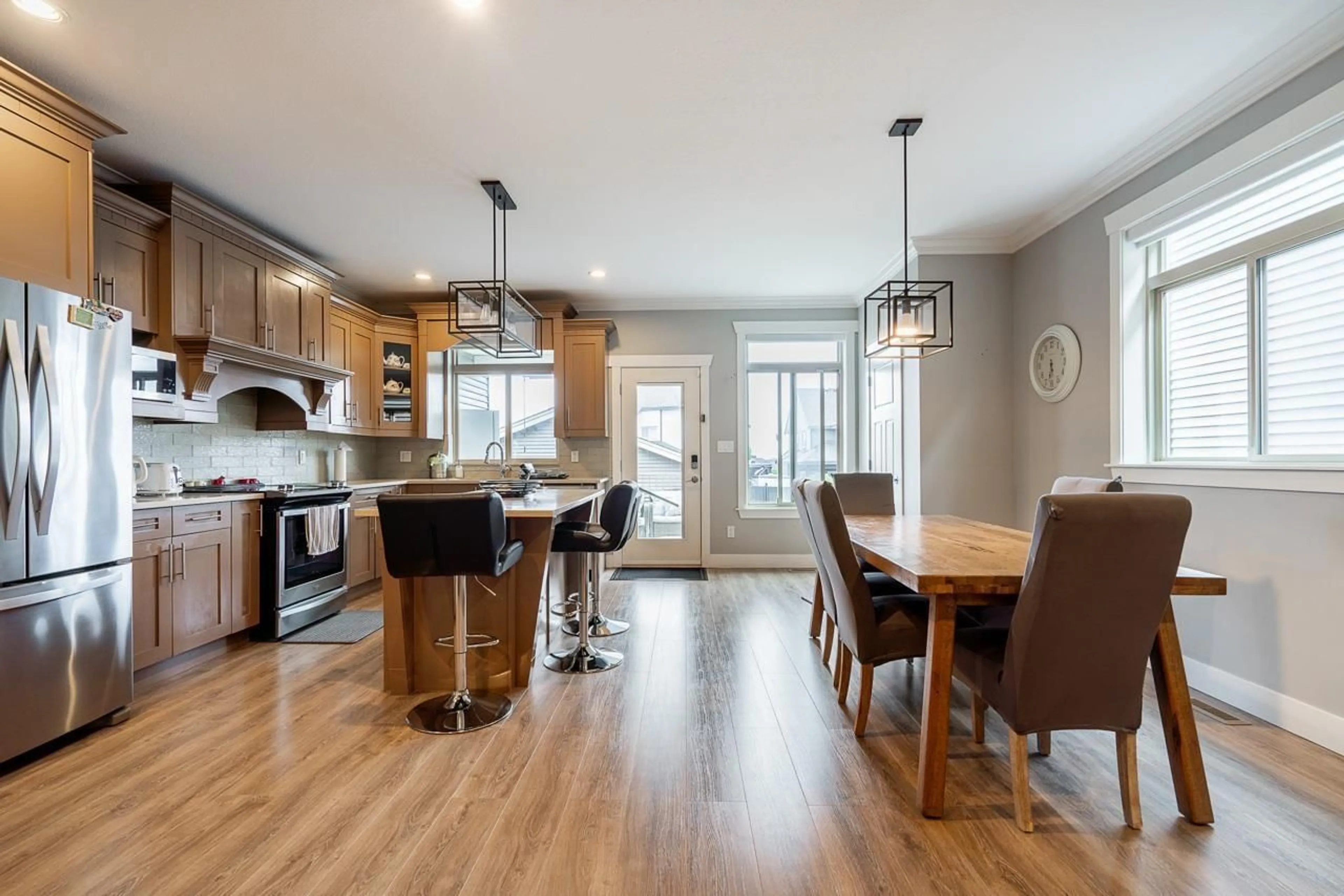 Open concept kitchen, wood/laminate floor for 6727 184, Surrey British Columbia V3S1E5