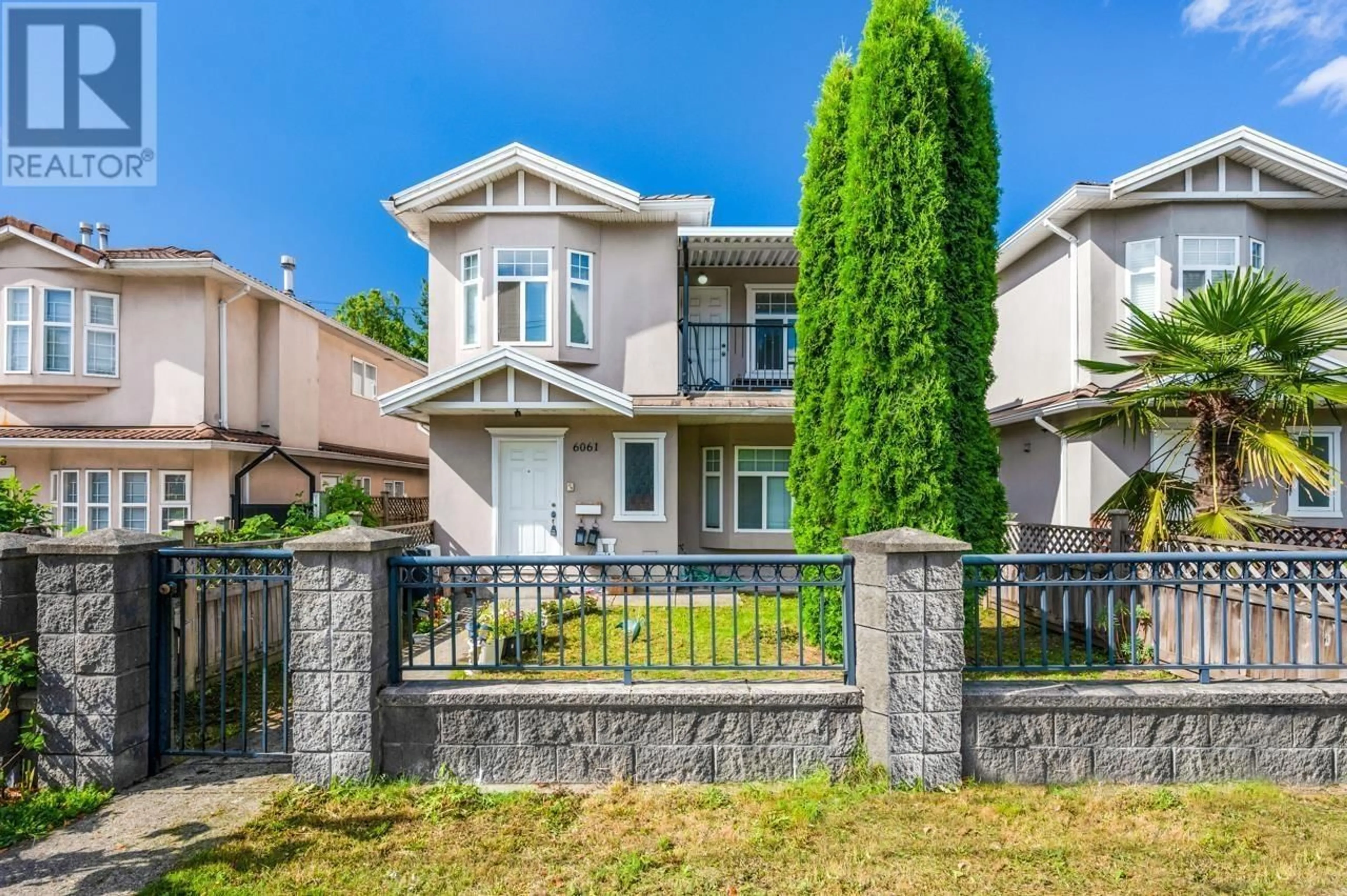 Home with vinyl exterior material, street for 6063 MAIN STREET, Vancouver British Columbia V5W2T6